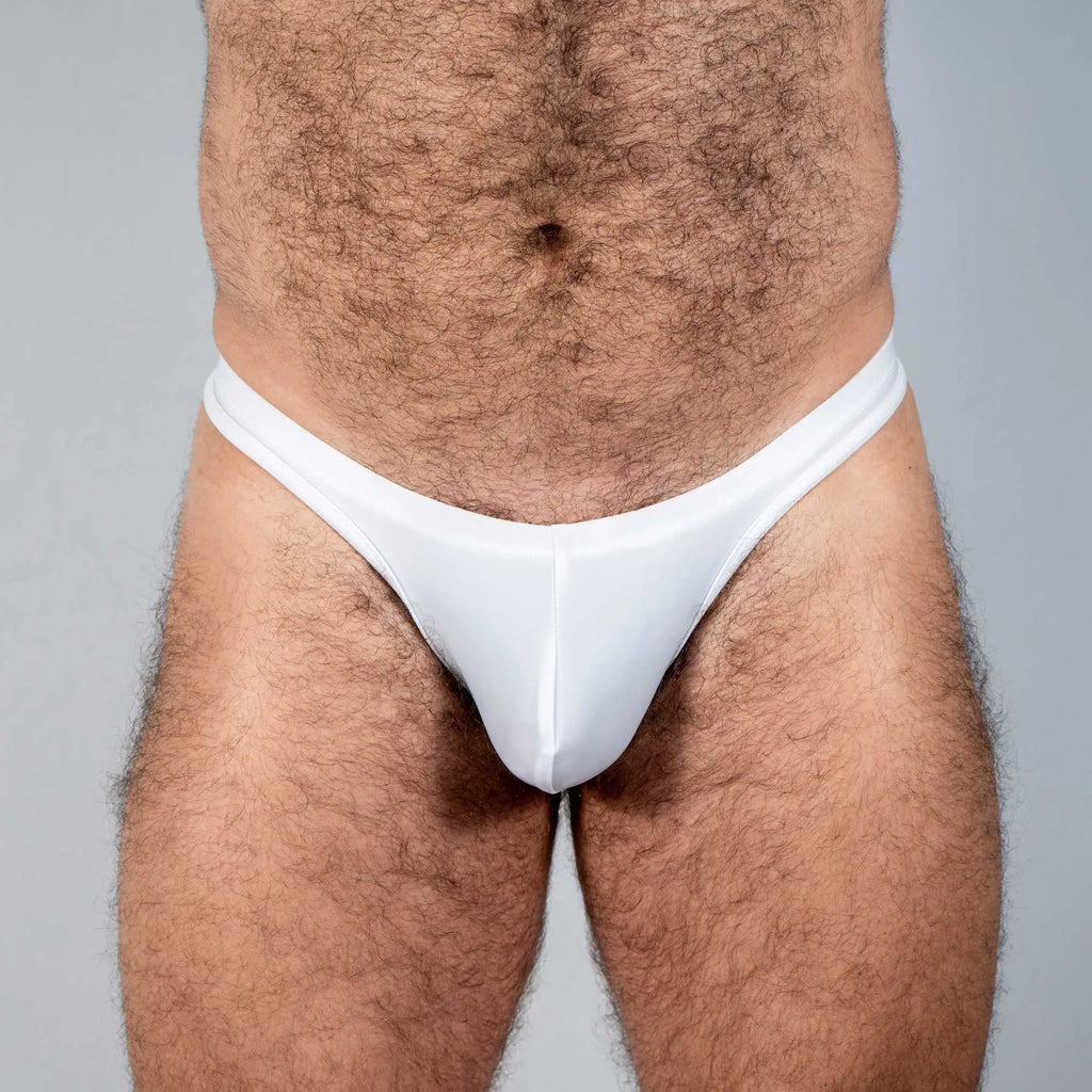 White thong briefs with smooth form-fitting design from tulio swim thong solids collection ideal for swimwear use