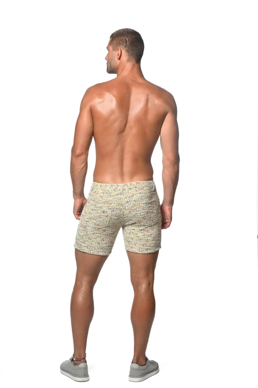 Beige tweed-look jacquard stretch knit jeans shorts with a subtle woven pattern and textured fabric