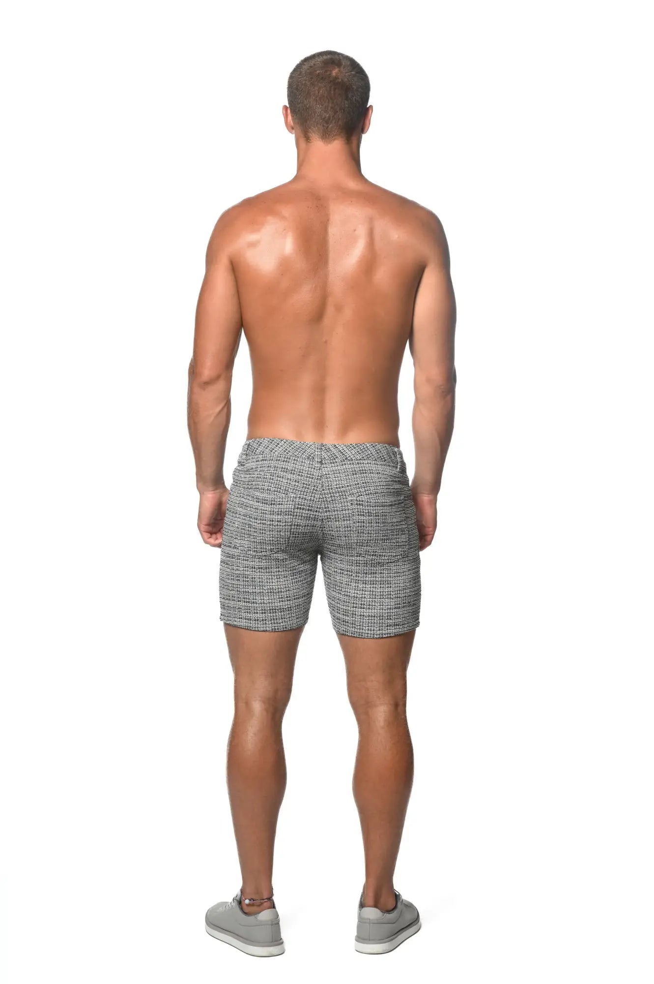 Gray tweed-look jacquard stretch knit jeans shorts with a tailored fit and herringbone pattern