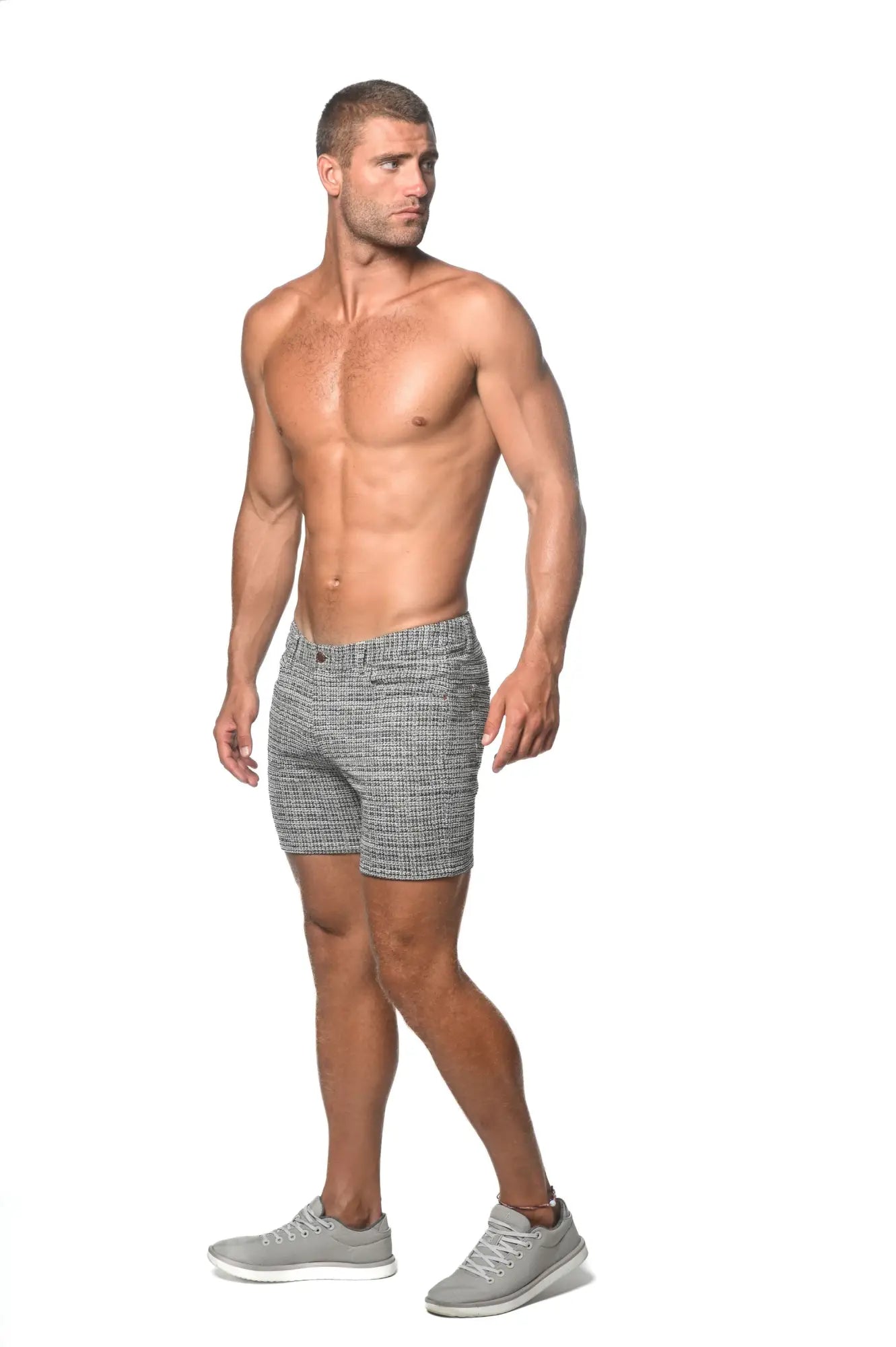 Gray tweed-look jacquard stretch knit jeans shorts with subtle herringbone texture for limited-edition style