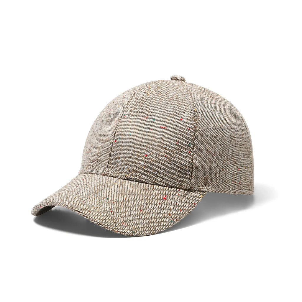 Beige tweed baseball cap with subtle red and green speckles featuring a textured fabric design