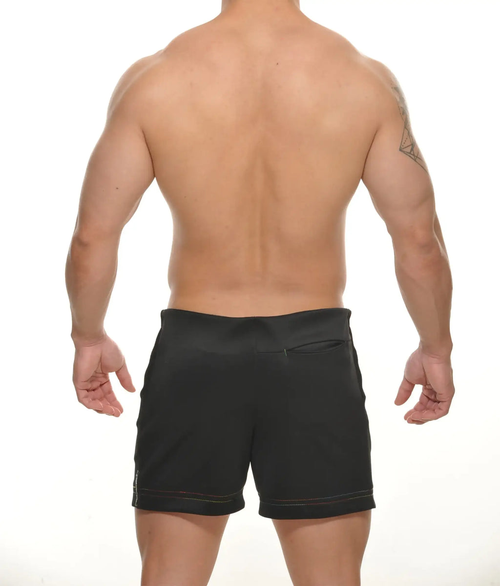 Black Tyler zipper athletic shorts with subtle red stitching along the hem designed for performance and comfort