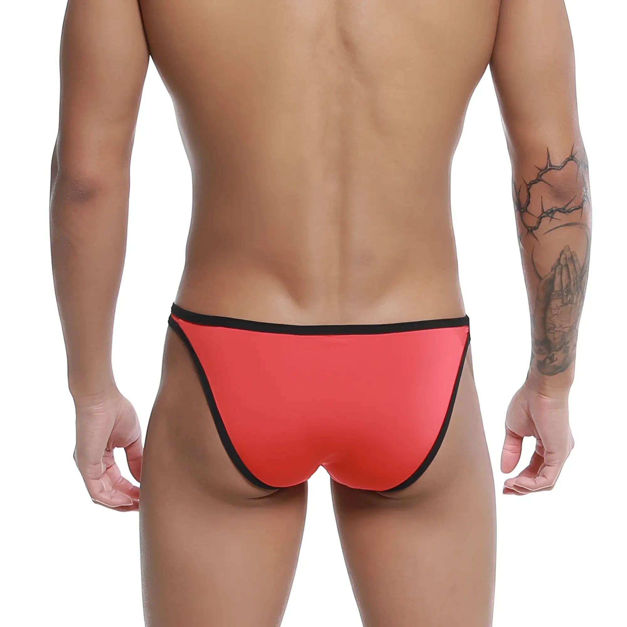 Bright red form-fitting u-station calypso bikini swim trunks with black trim along waistband and leg openings