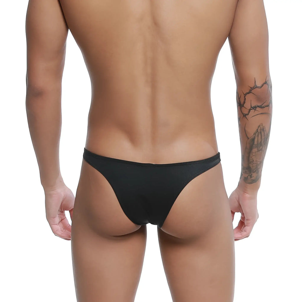 Black thong made of smooth stretchy fabric with sleek minimalist design shown from the back u-station dream bikini black u0002-001