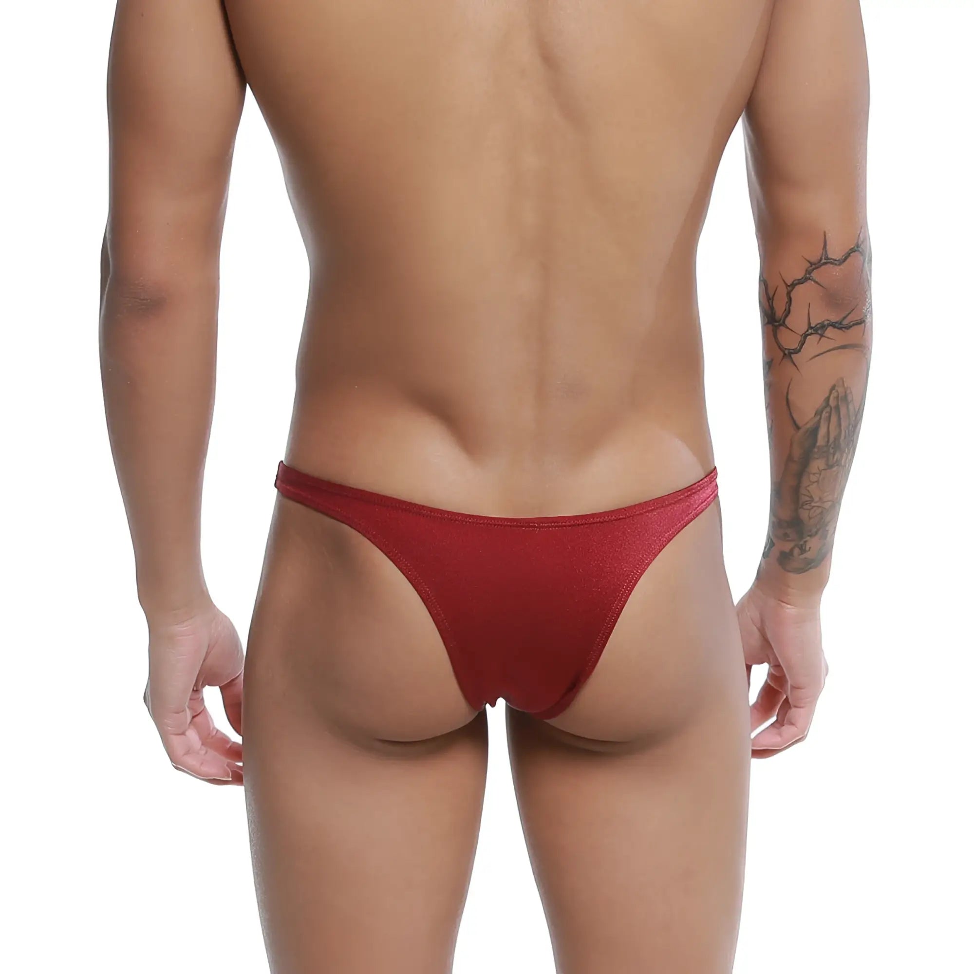 Red form-fitting thong made of smooth stretchy fabric shown from the back in u-station dream bikini burgundy u0002-601