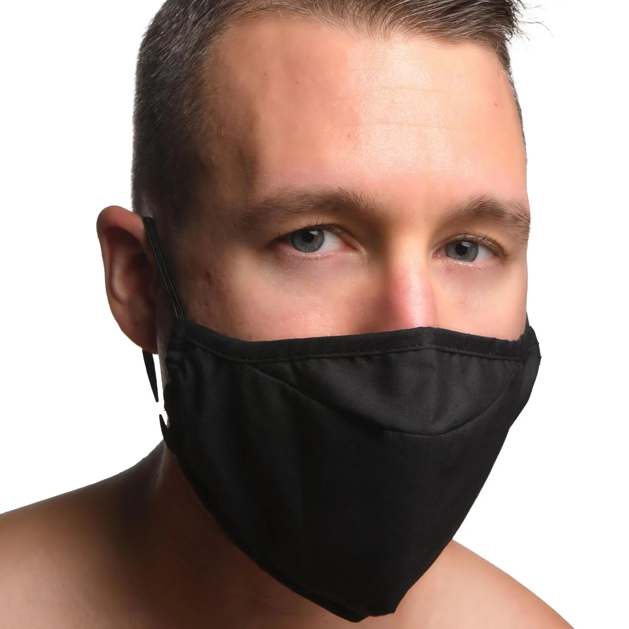 Black fabric face mask with adjustable ear loops featuring Under Cover Ball Gag design for comfort and style