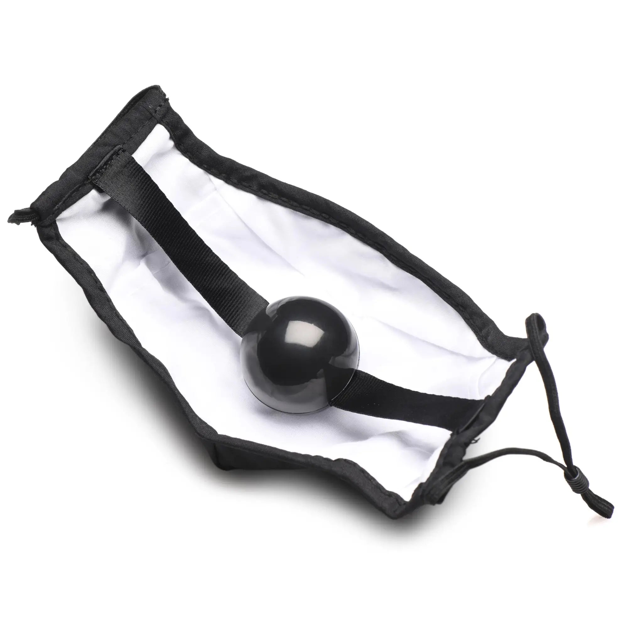 Black spherical ball gag face mask with smooth glossy finish inside a white drawstring pouch lined with black fabric
