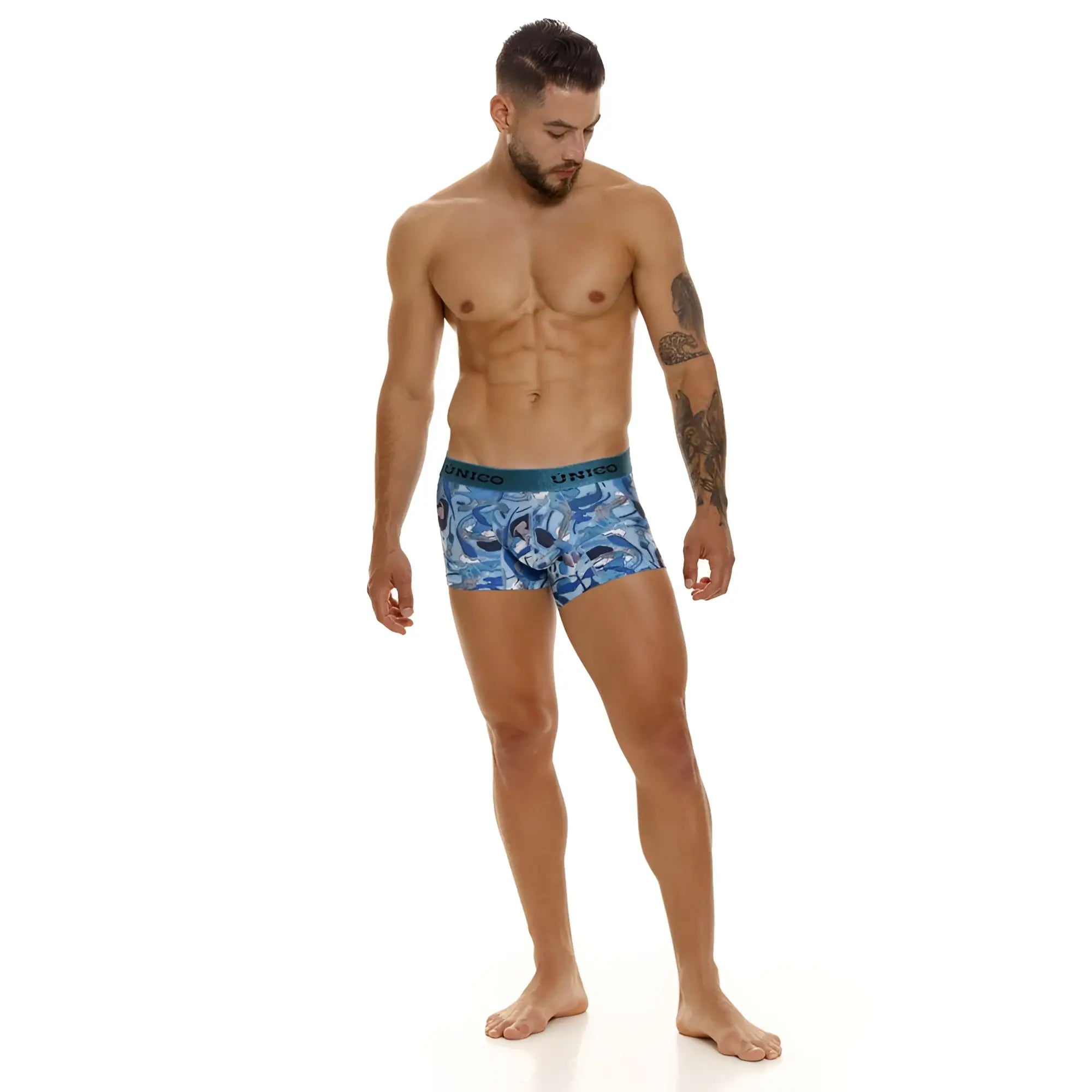 Blue patterned unico boxer briefs with teal waistband featuring the unico brand name in color 46-blue