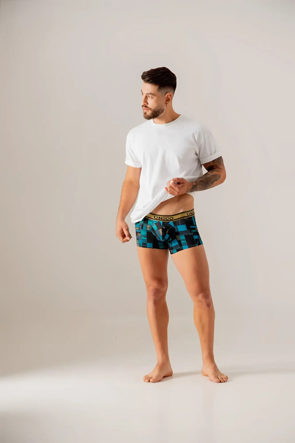Blue and black geometric patterned boxer briefs with gold virgo waistband from unico 24010100104 esquema trunks