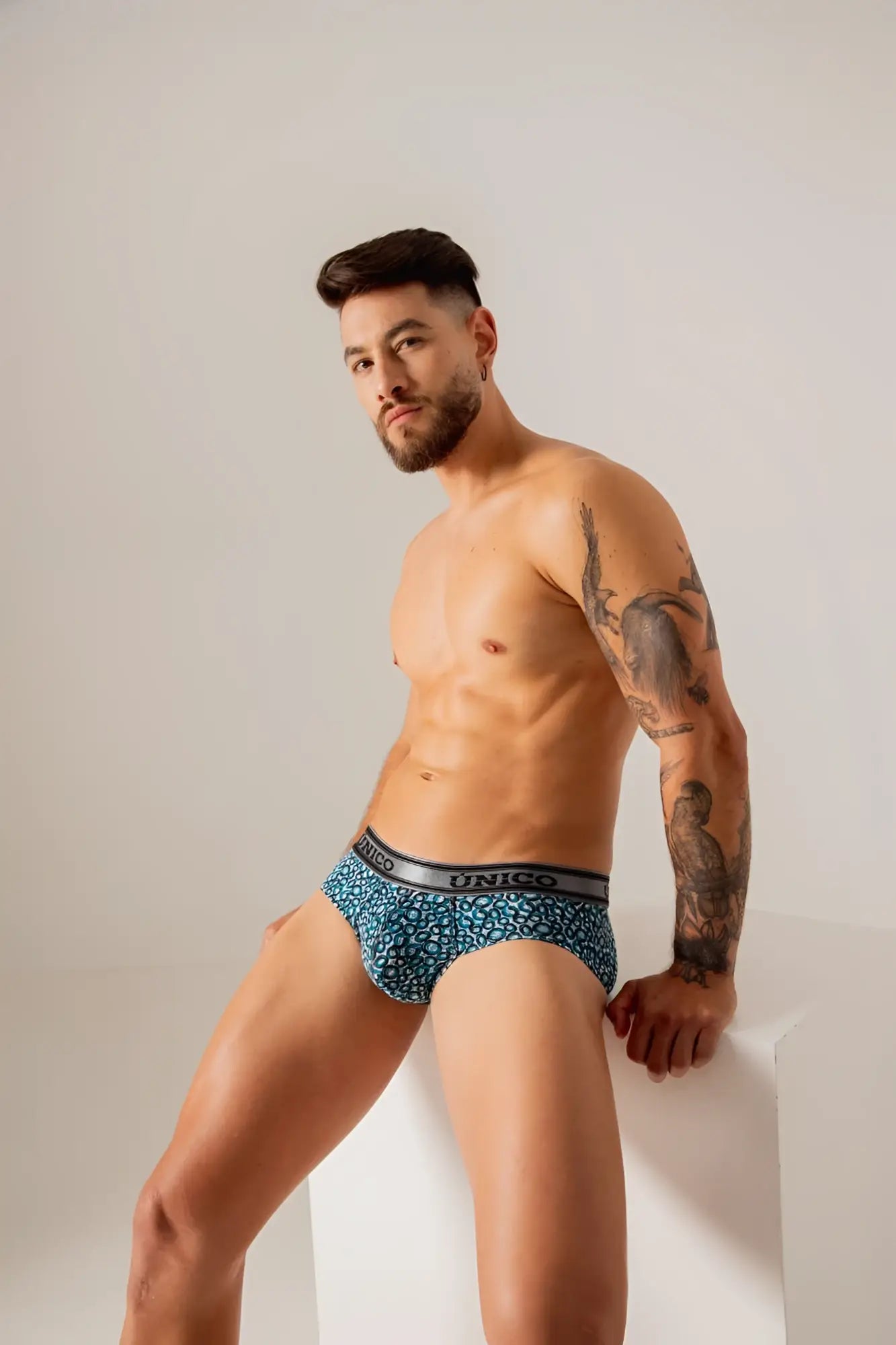 Blue leopard-print unico 24020101110 redondel briefs with black elastic waistband in color 46-blue for comfortable wear