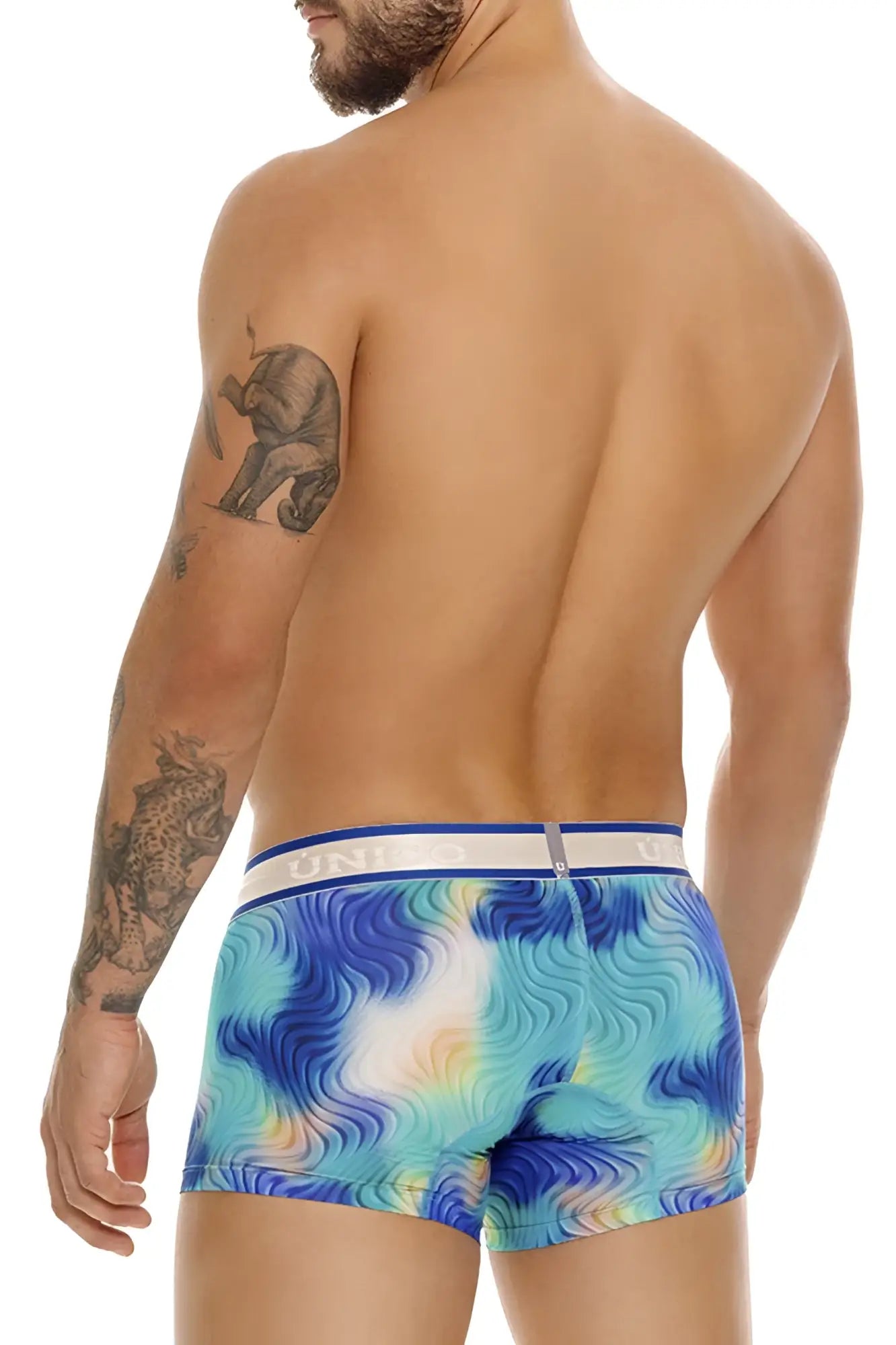 Blue and white tie-dye men’s briefs with a blue waistband featuring unidos branding unico 24100100105 moscatel trunks