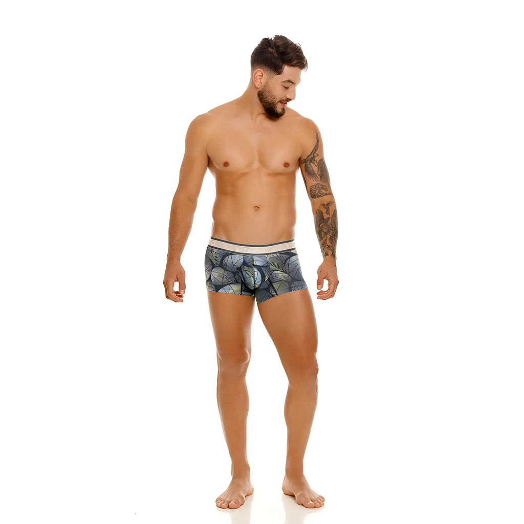 Unico 24100100113 resplandecer trunks in gray featuring blue patterned boxer briefs with white waistband