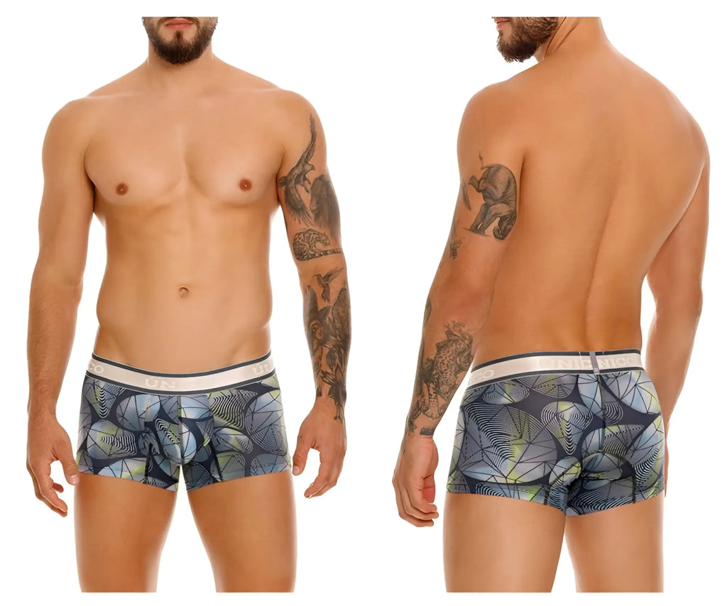 Men’s Unico Resplandecer trunks in gray with blue green abstract leaf pattern on navy with white elastic waistband