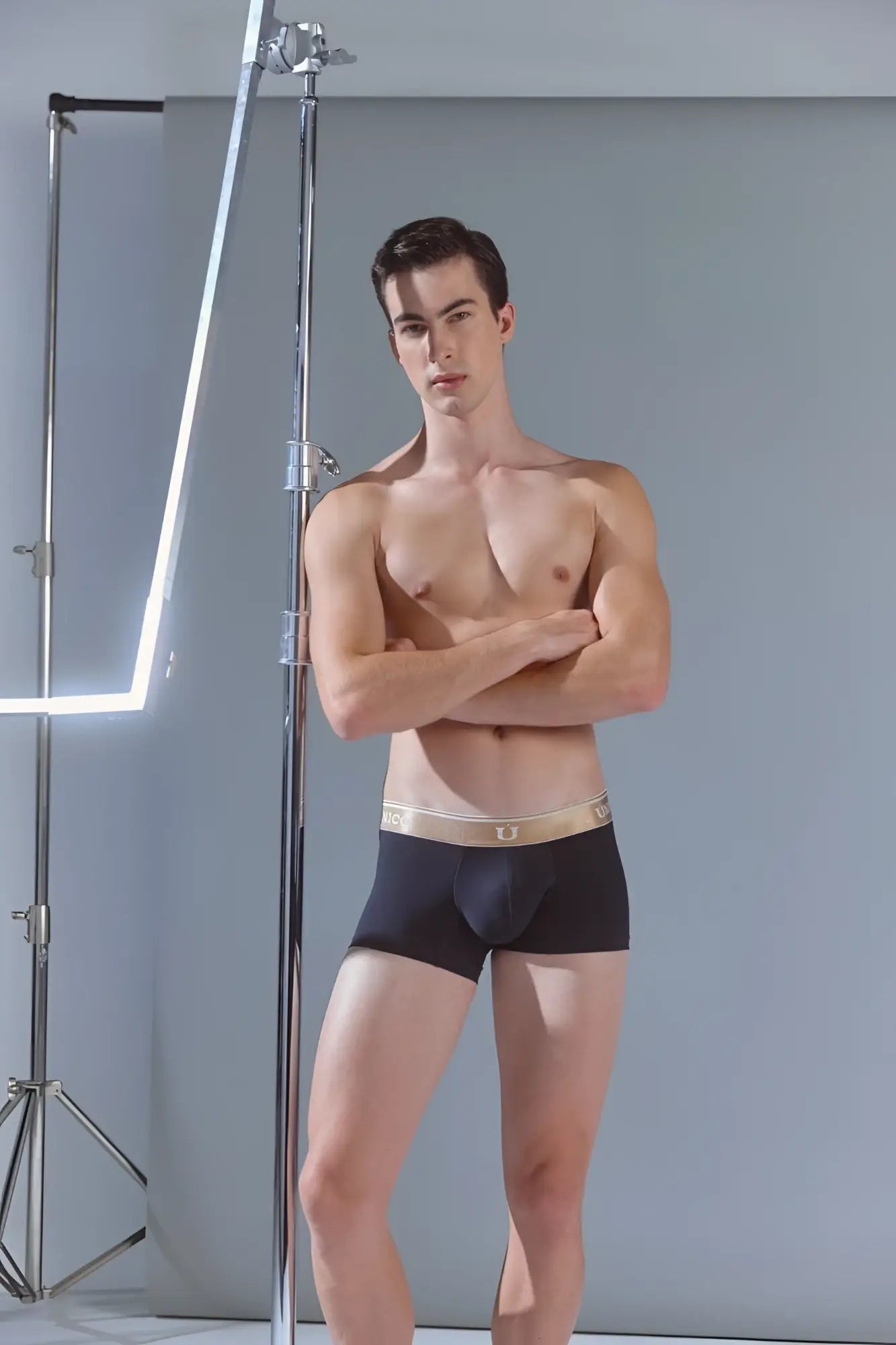 Black Unico 24110100110 Lingote trunks with gold waistband featuring the brand logo in briefs style