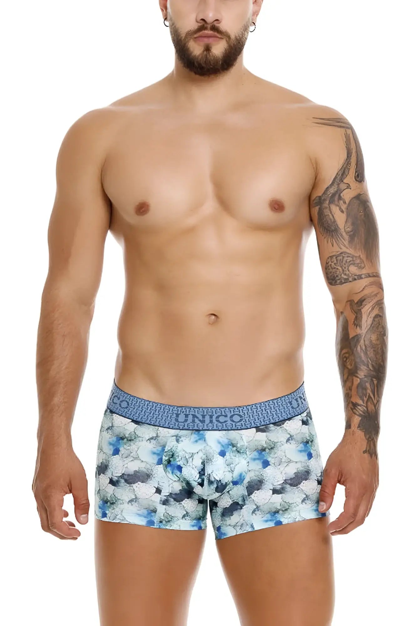 Blue and white floral patterned men’s briefs with branded elastic waistband from unico 25020100104 abalon trunks color 43-blue