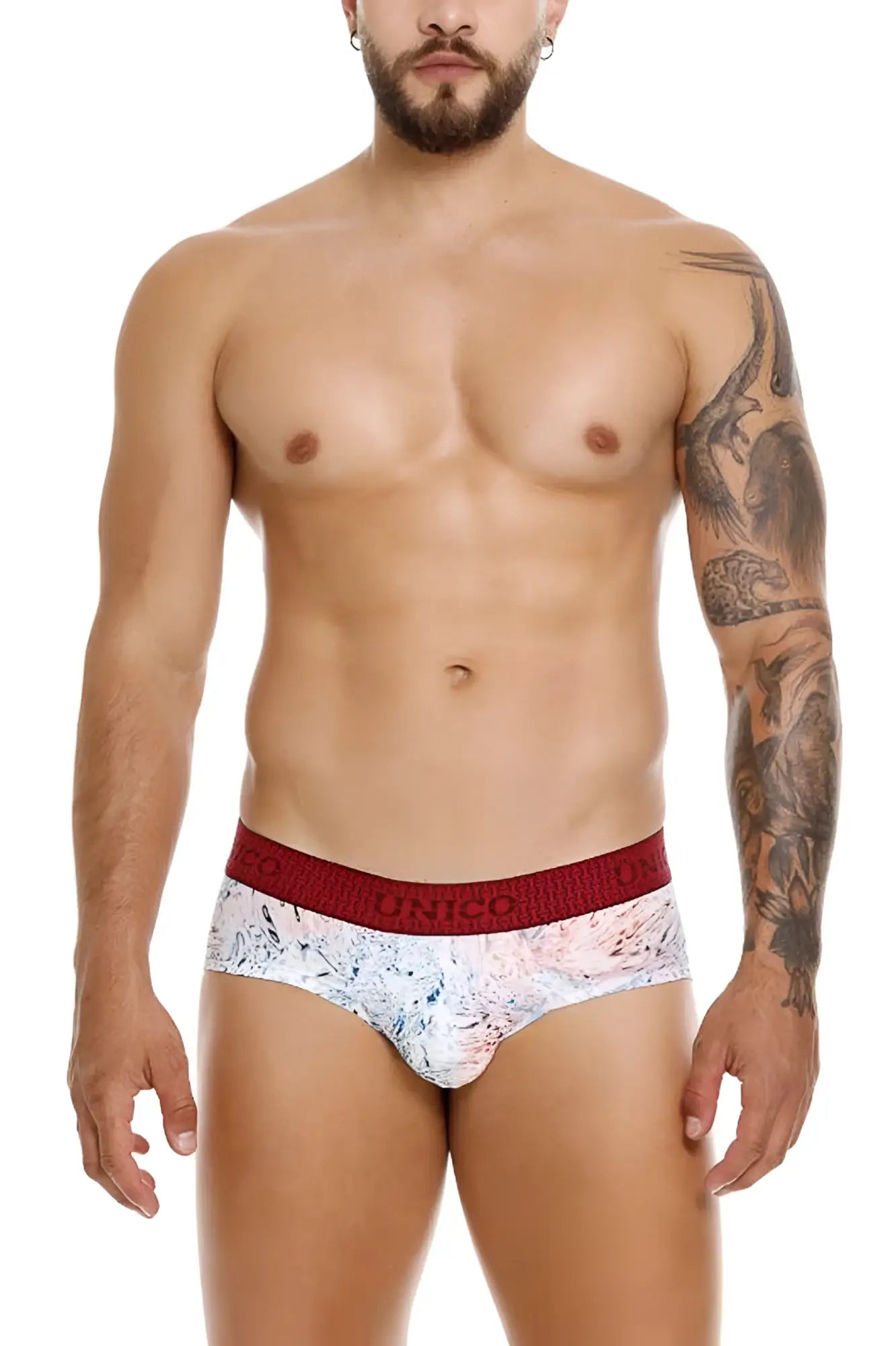 White and red patterned unico 25020101103 rizo briefs with bold red elastic waistband and unico branding