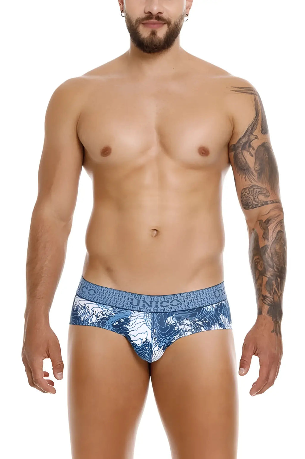 Blue and white patterned unico barniz briefs with repeating logo waistband in color 46 blue for men