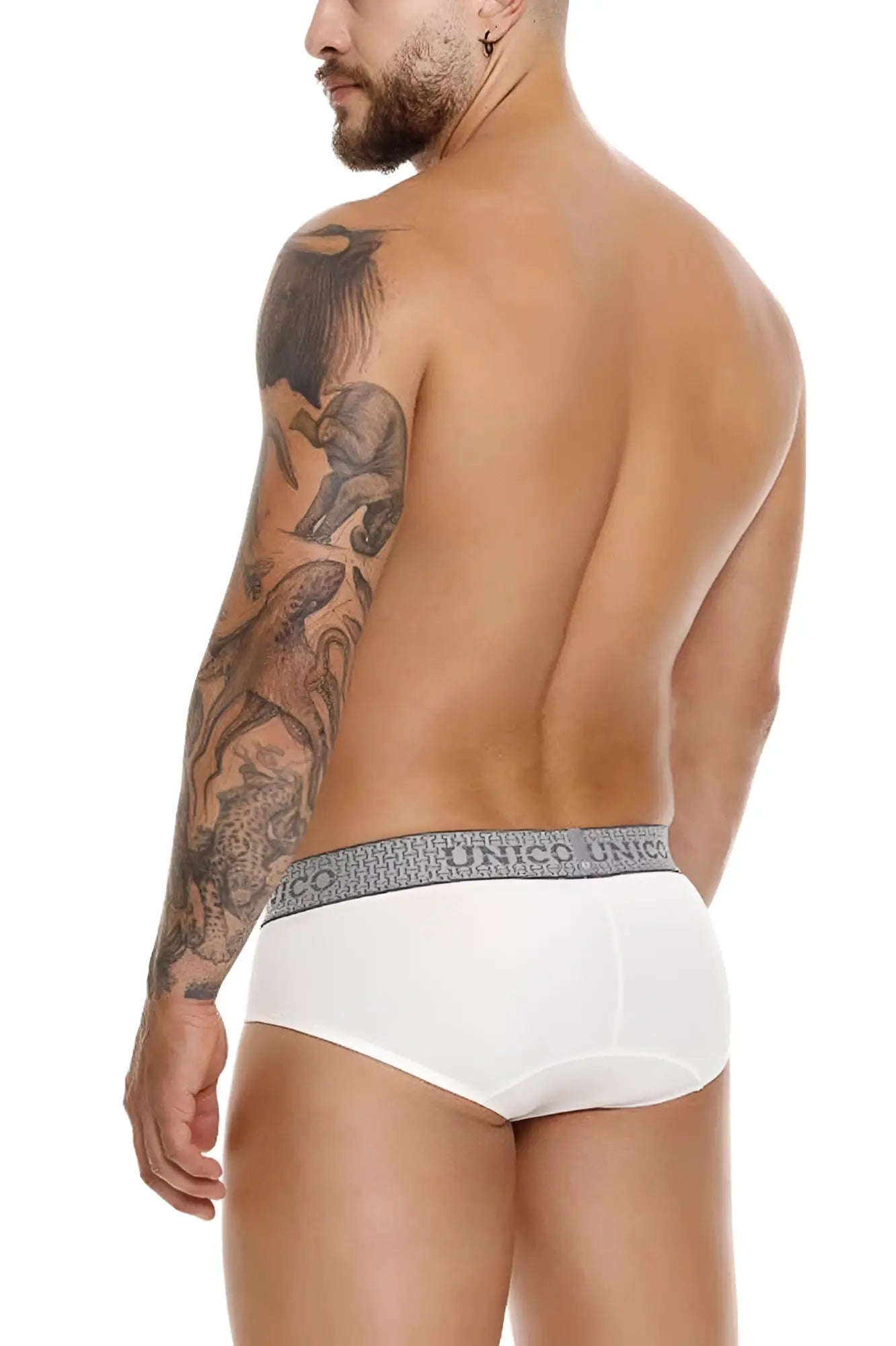 White unico 25020101120 marfil briefs featuring gray elastic waistband with repeating unico brand name in color 02-white