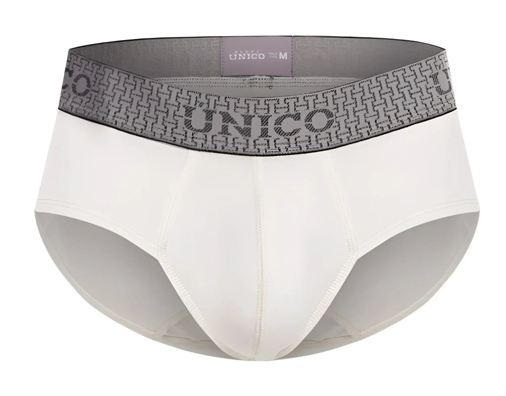 White unico 25020101120 marfil briefs with a gray patterned waistband featuring the unico brand name in bold letters