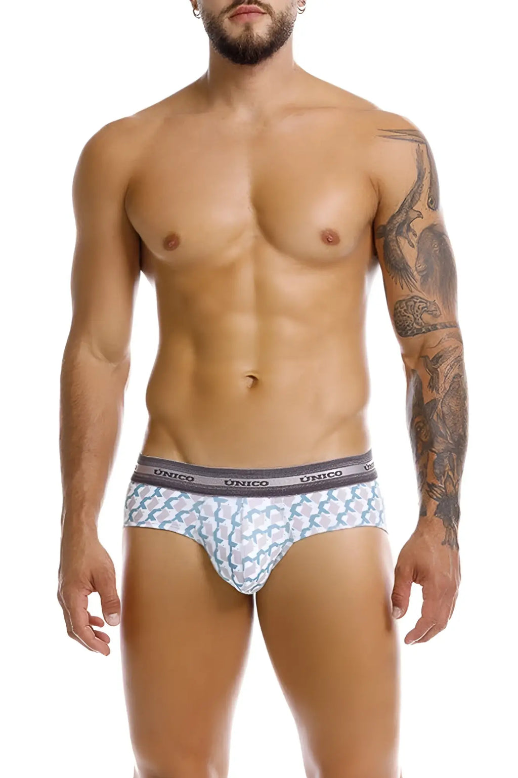 White briefs with light blue and gray geometric pattern and unico branded elastic waistband in color 43 printed design