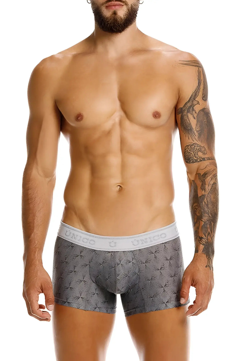 Gray patterned Unico 25050100103 Chisell trunks with white elastic waistband featuring the Unico brand name