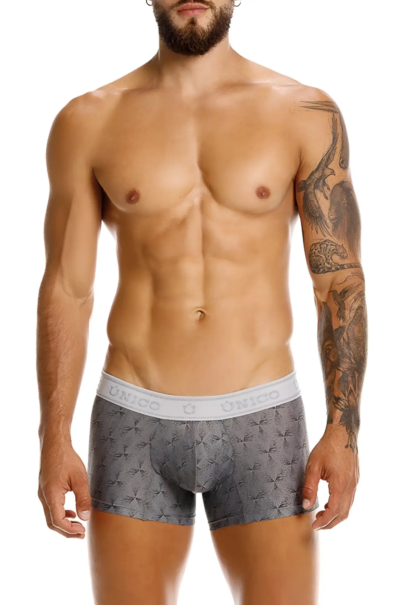 Gray patterned Unico 25050100103 Chisell trunks with white elastic waistband featuring the Unico brand name