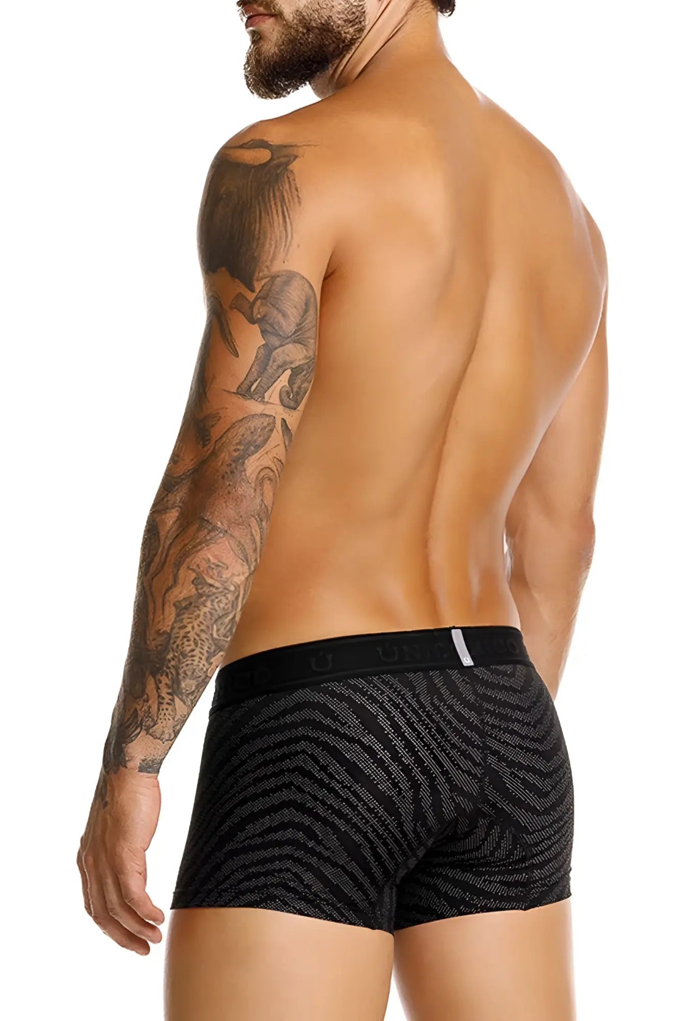 Black unico zelmur trunks with subtle zebra-striped pattern and branded elastic waistband in color 99 black
