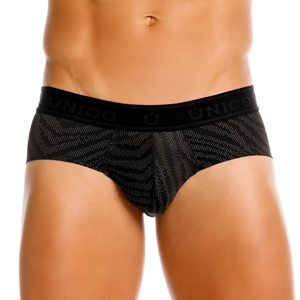 Black unico men’s briefs featuring a subtle geometric pattern with faint white dots and brand embroidery on waistband