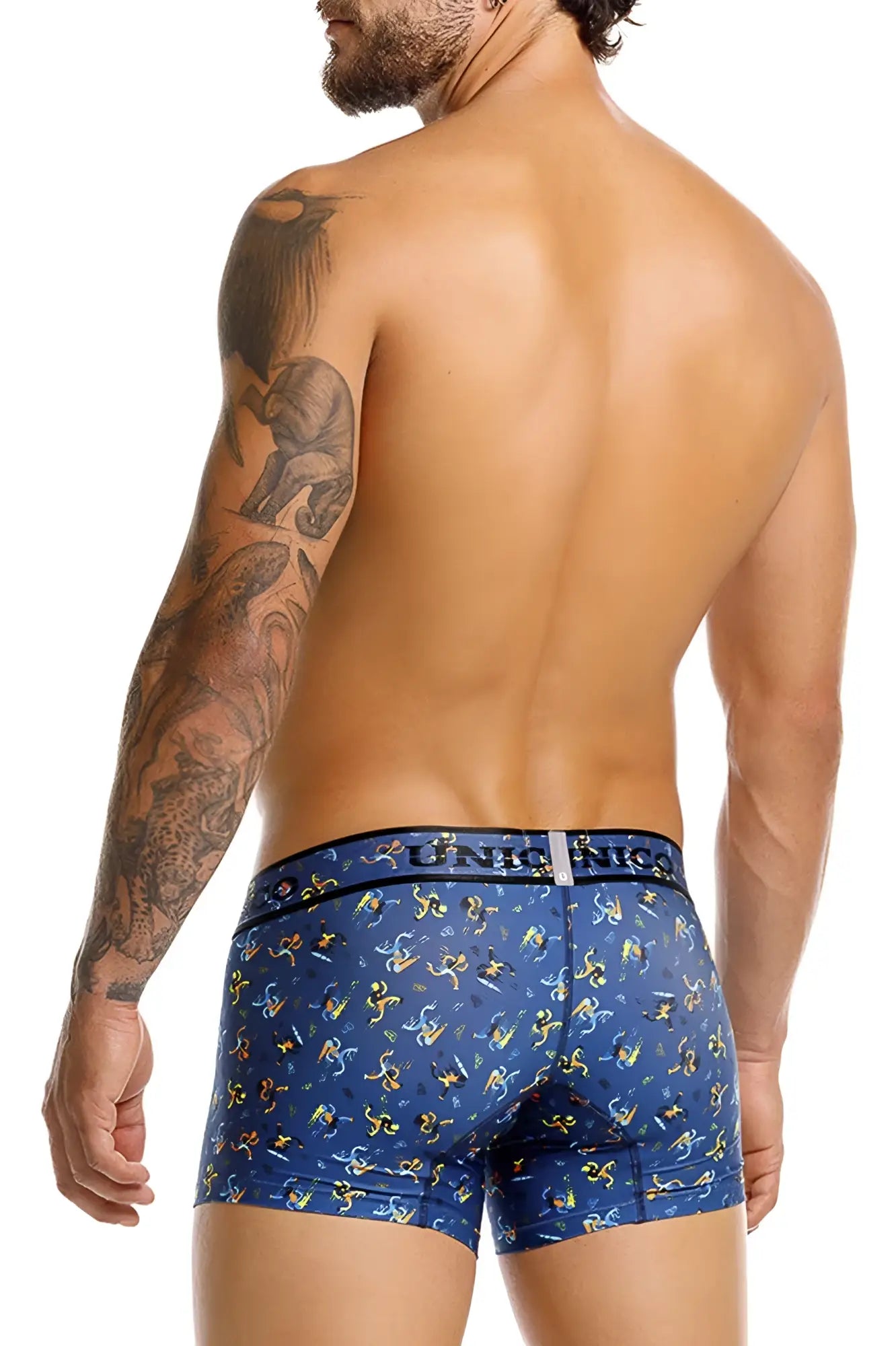 Blue boxer briefs with yellow and white cartoon pattern and unico 25060100106 pacer trunks waistband in color 46-blue