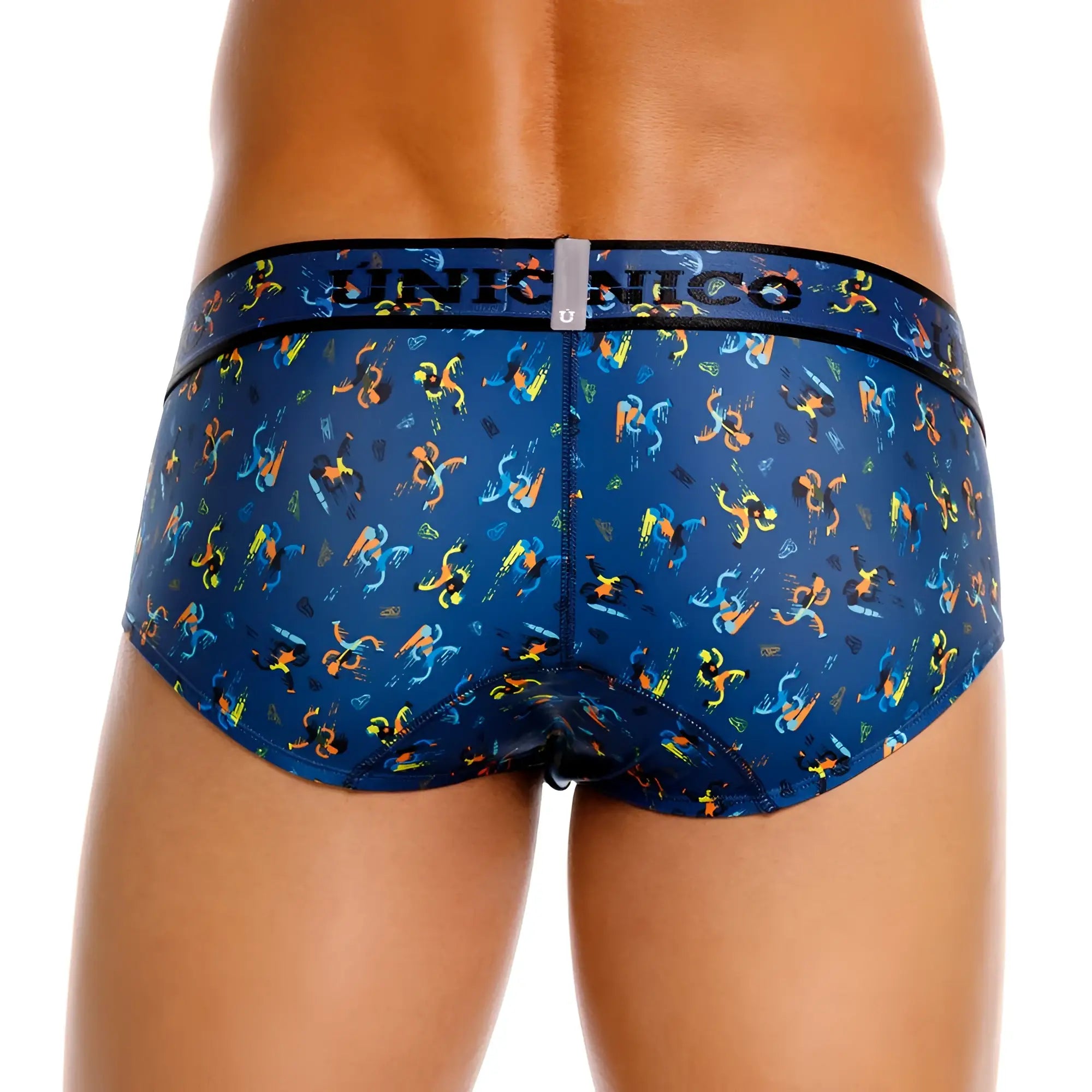 Blue patterned men’s briefs with vibrant orange and yellow stylized figures in unico 25060101106 pacer briefs color 46-blue