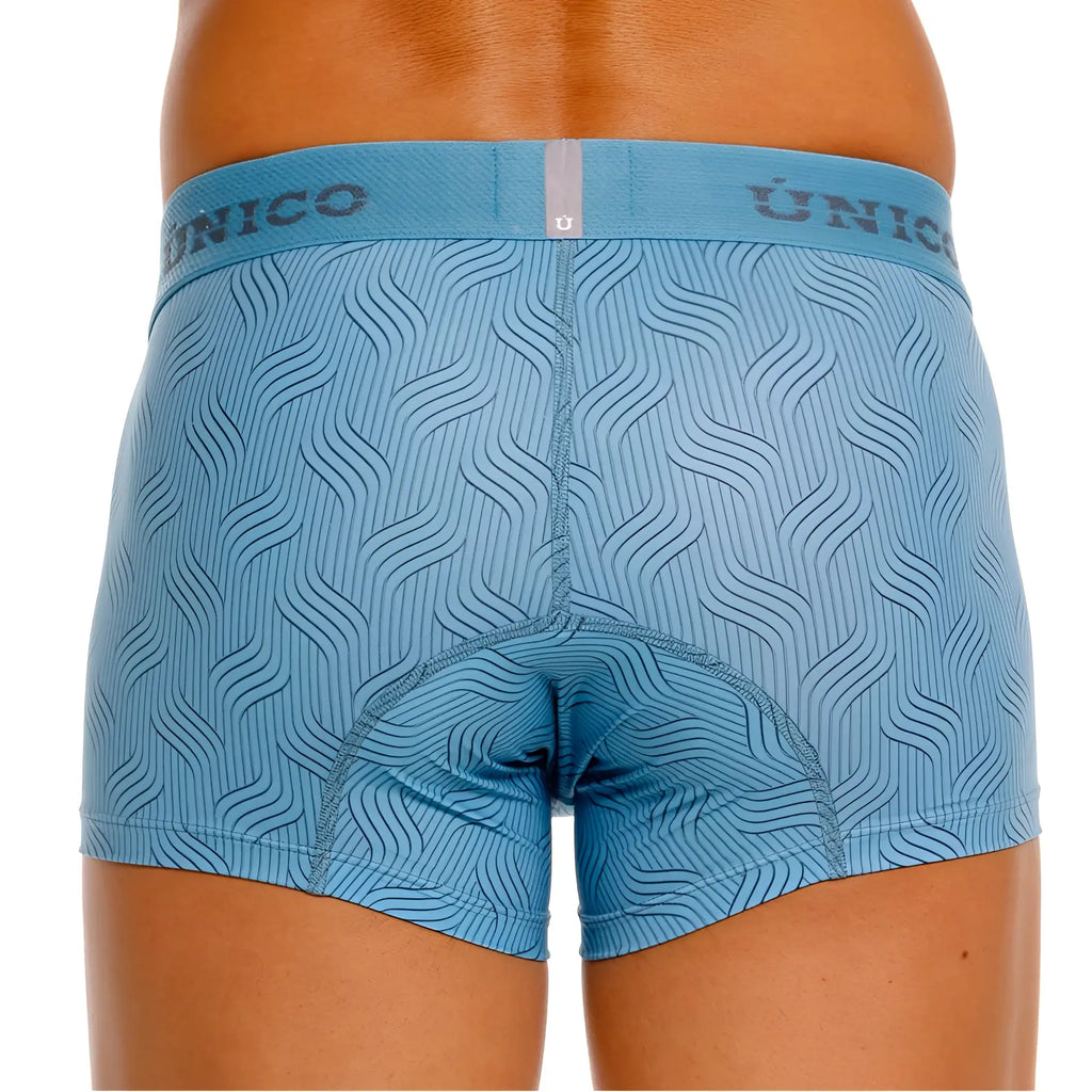 Light blue unico 26020100111 lenoso trunks with subtle wavy pattern and branded waistband for comfortable wear
