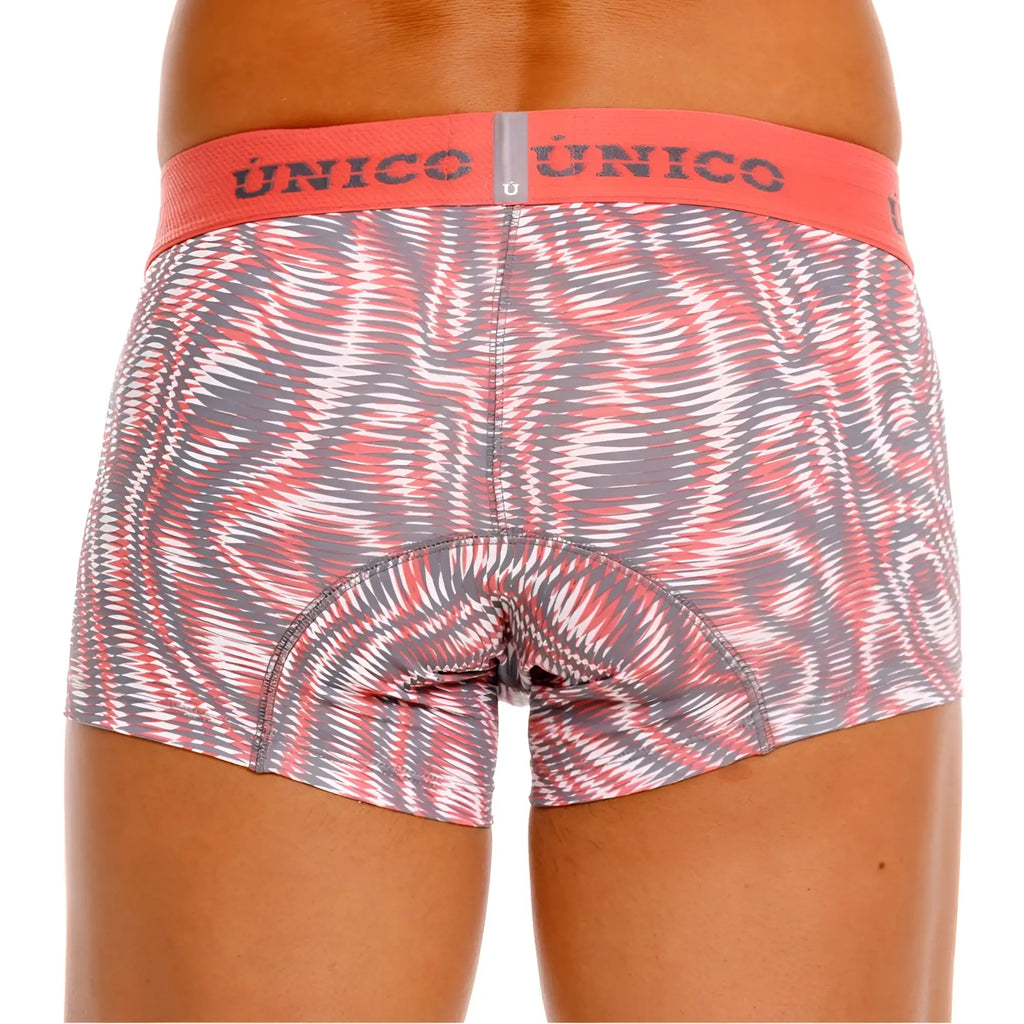 A pair of unico 26020100116 acanalado trunks men’s boxer briefs with pink gray white swirl pattern and orange waistband