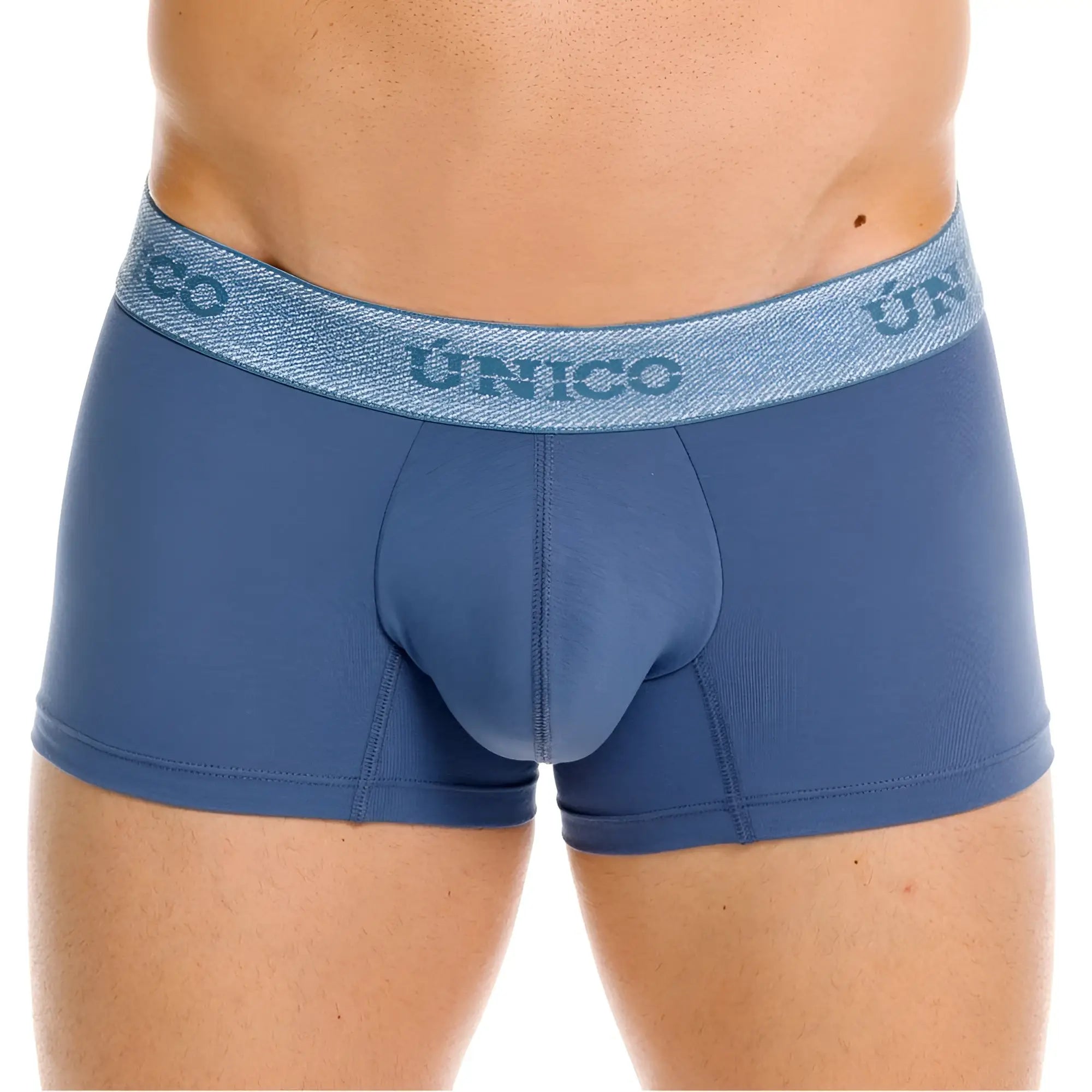 Blue unico men’s boxer briefs with textured waistband and matching blue brand lettering in color teal