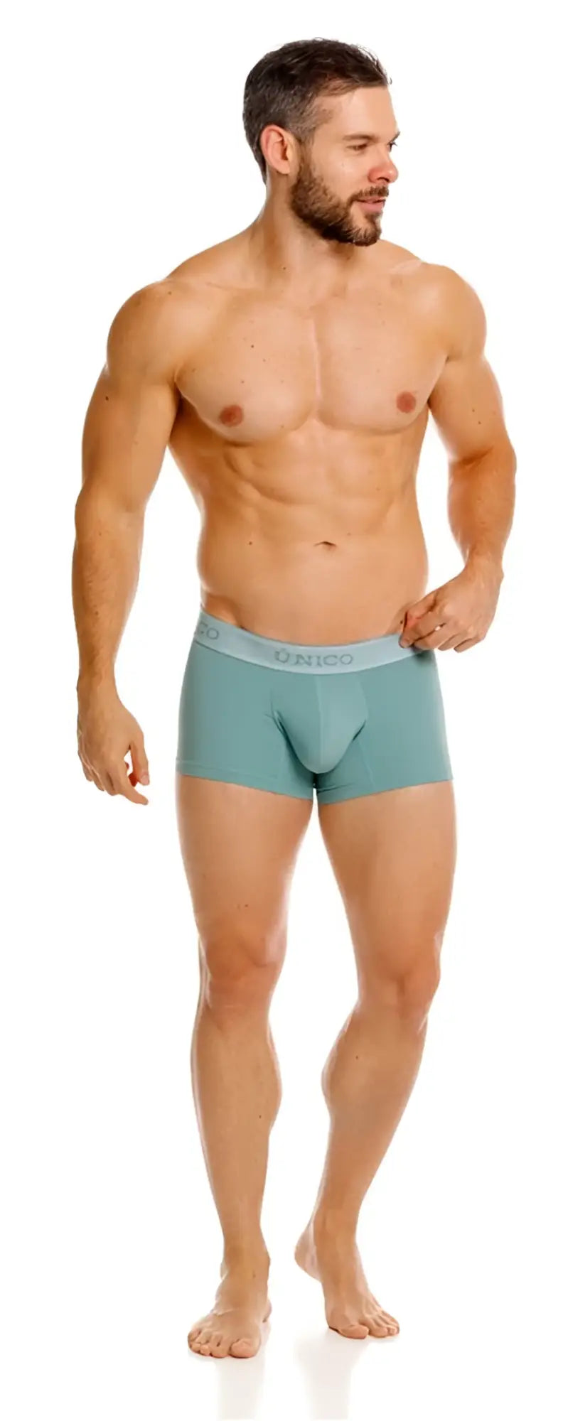 Teal men’s ceramic trunks with light gray elastic waistband branded unido in color 43 green