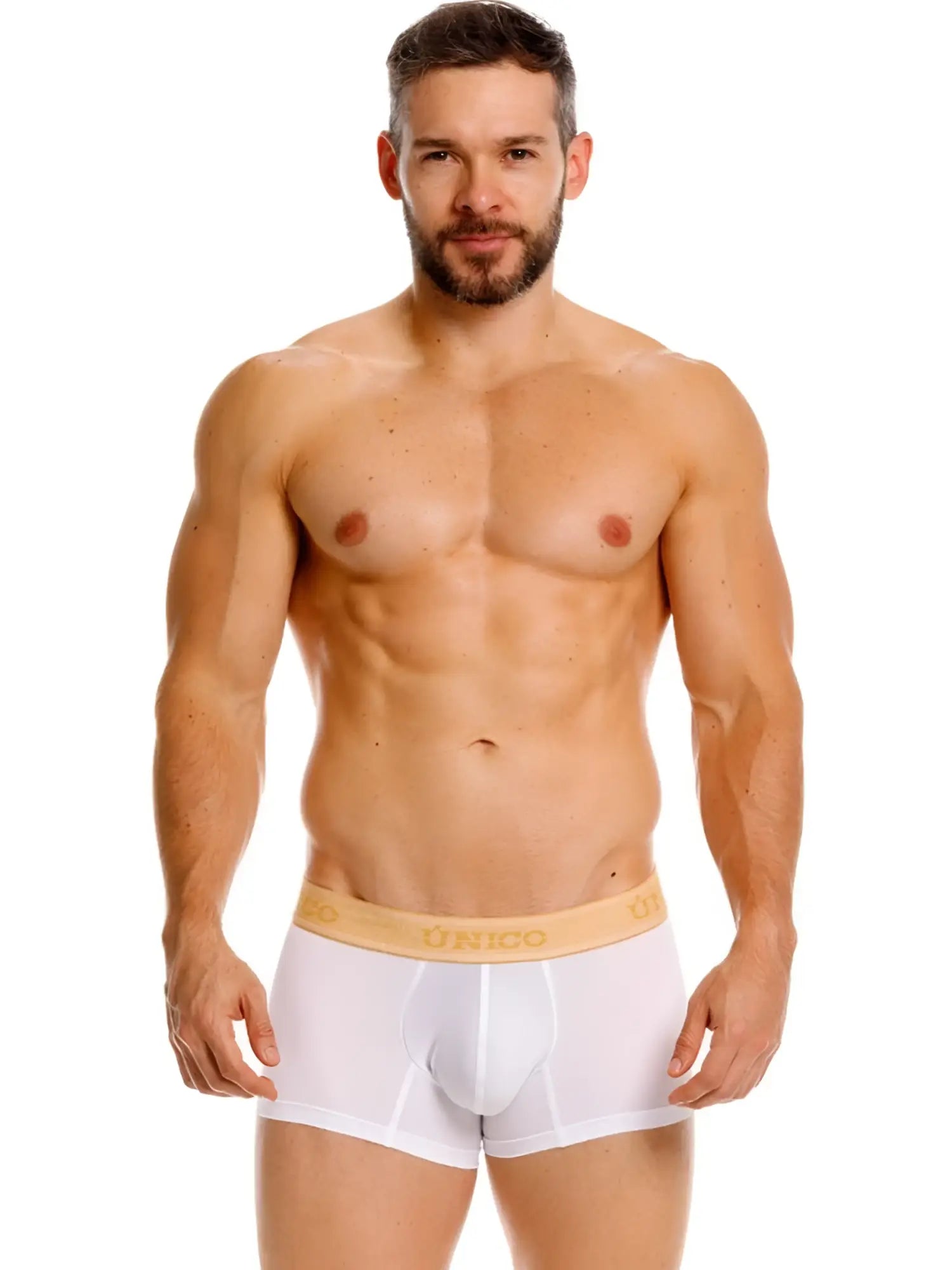 White premium athletic fit briefs with tan elastic waistband and gold unico branding in amber trunks style
