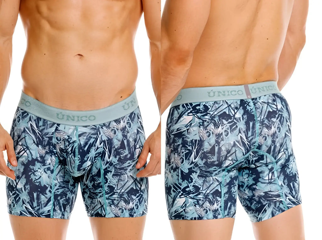 Men’s blue and teal tropical leaf patterned boxer briefs with light gray único waistband in color 43-blue