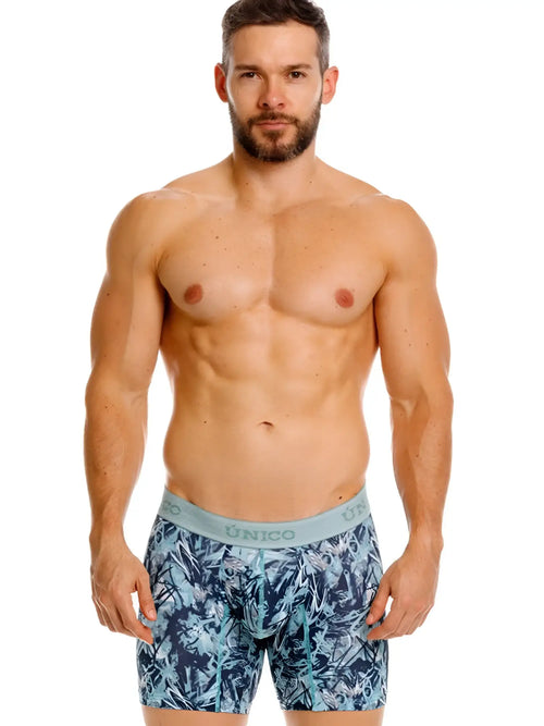 Men’s blue and teal tropical leaf patterned boxer briefs with light gray unico waistband in color 43-Blue