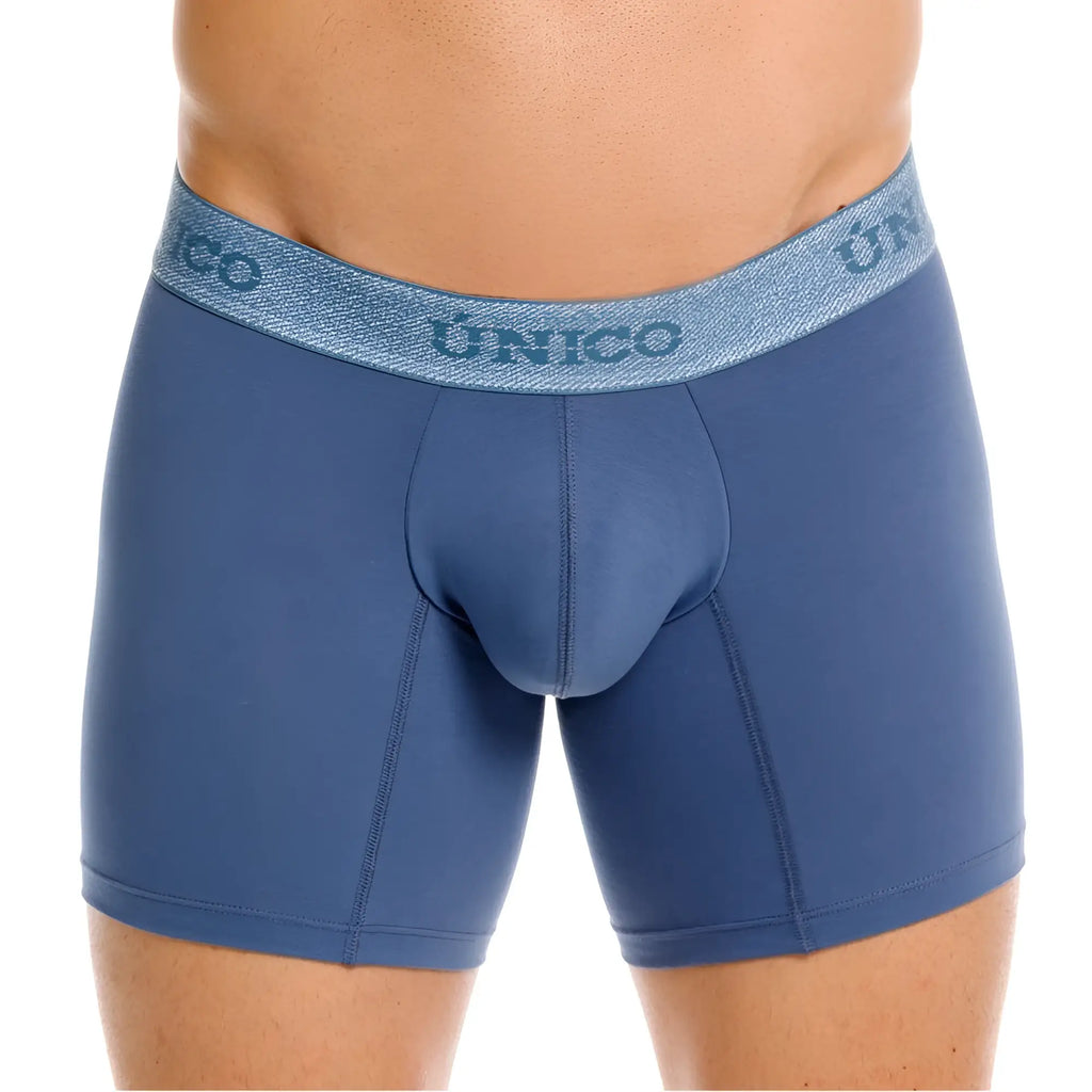 Blue unico boxer briefs in teal with a textured waistband featuring unico branding for premium comfort and style