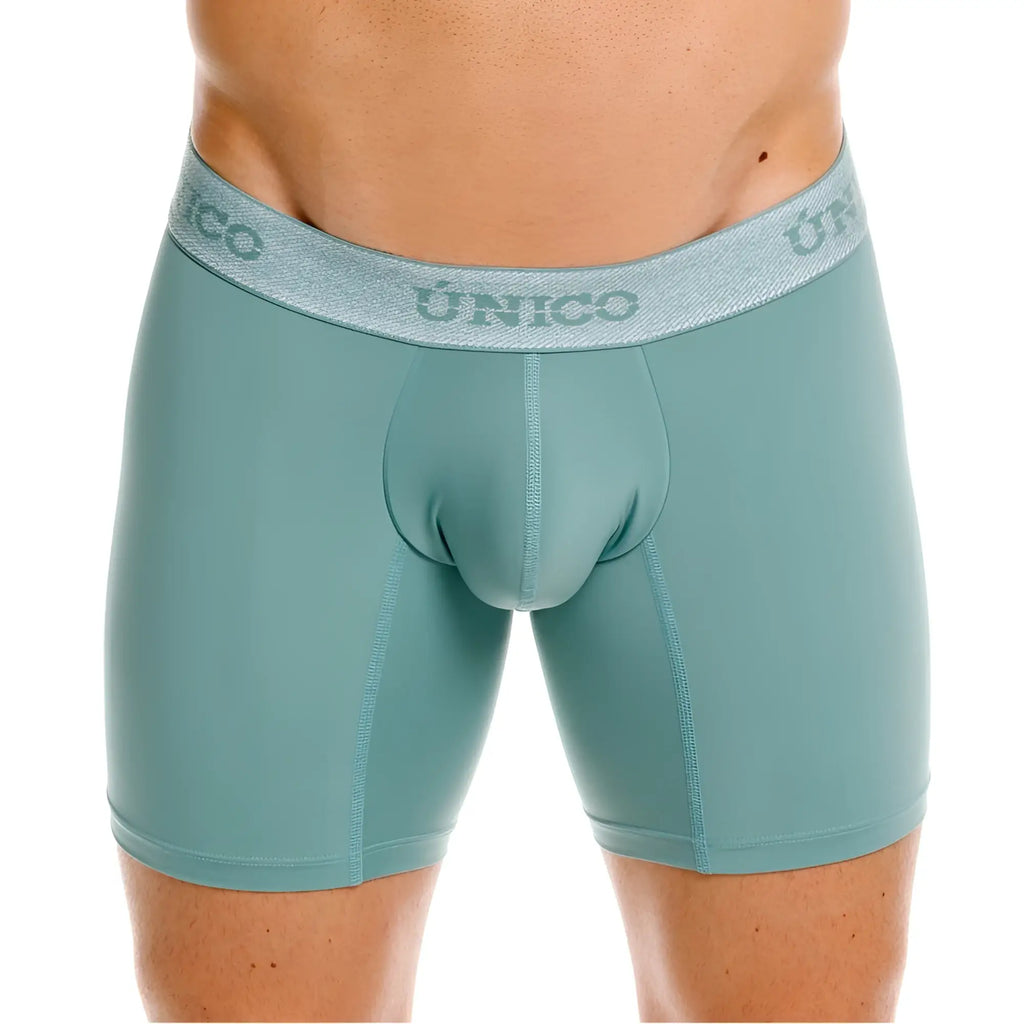 Teal form-fitting ceramic boxer briefs with textured gray waistband featuring the único brand logo color 43-green
