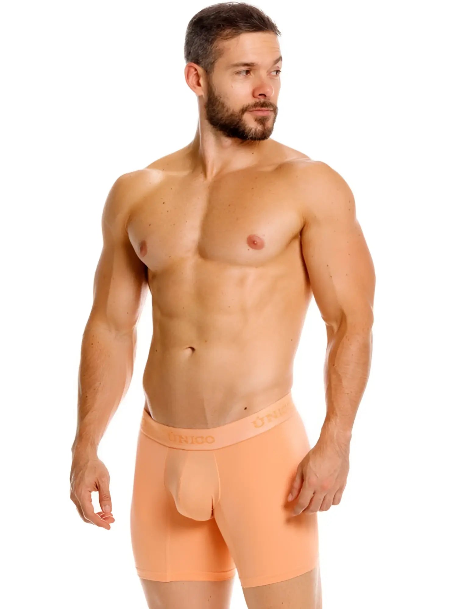 Orange unico classic boxer briefs in apricot feature a smooth form-fitting design for essential comfort wear