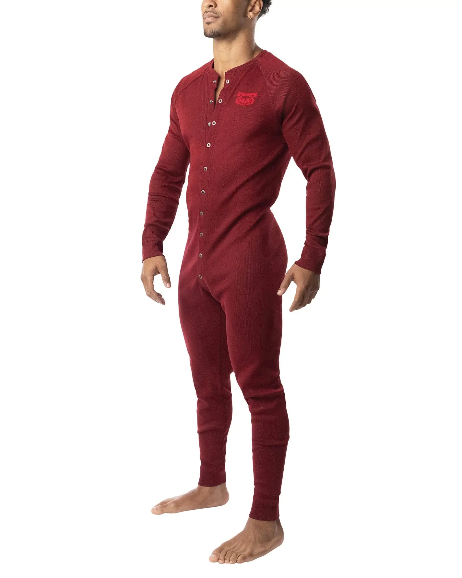 A maroon long-sleeved one-piece thermal union suit 2.0 with button-down front and chest embroidered logo