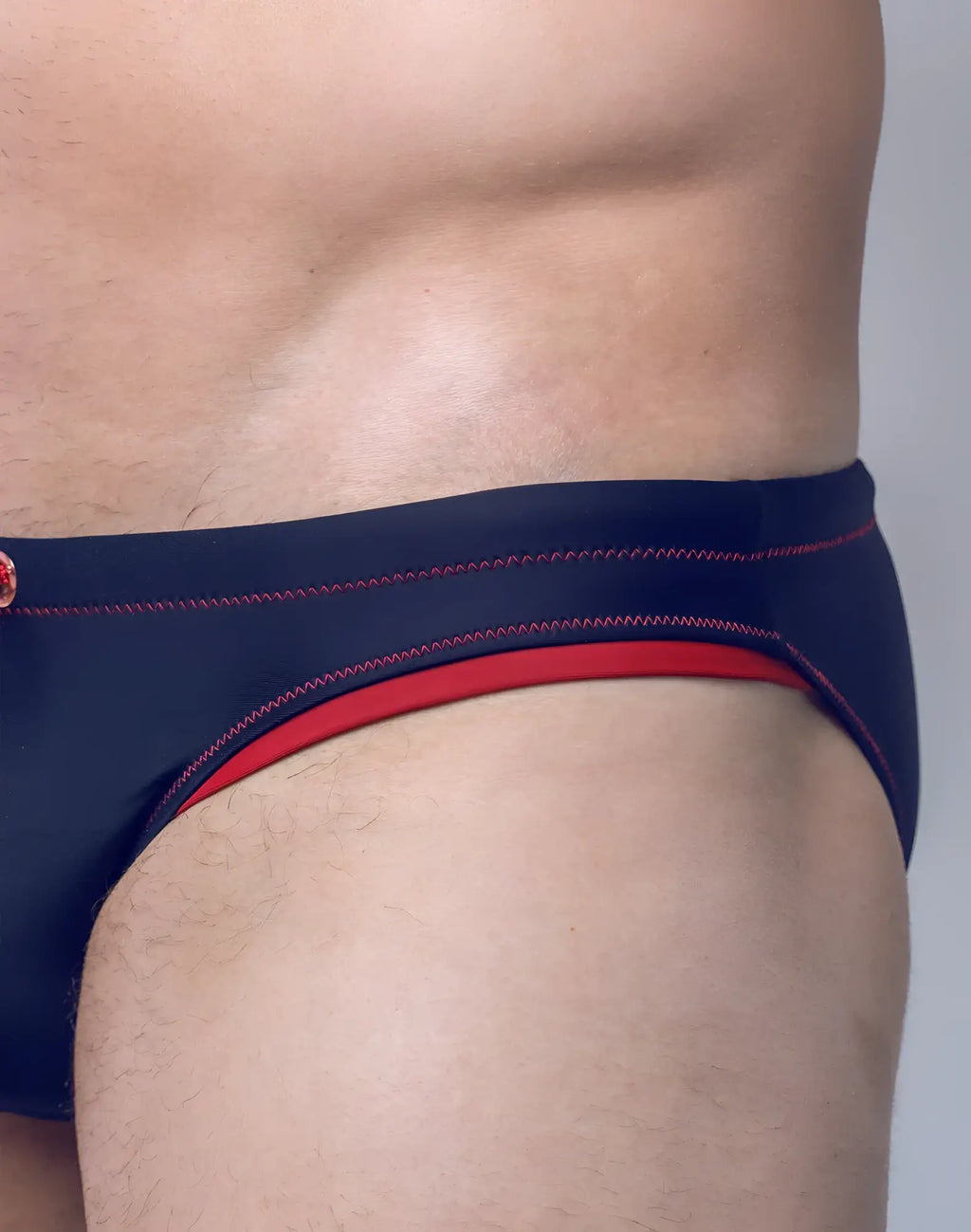 Navy blue V22 rapid swim brief with red trim and contrasting stitching designed for fast drying and comfort