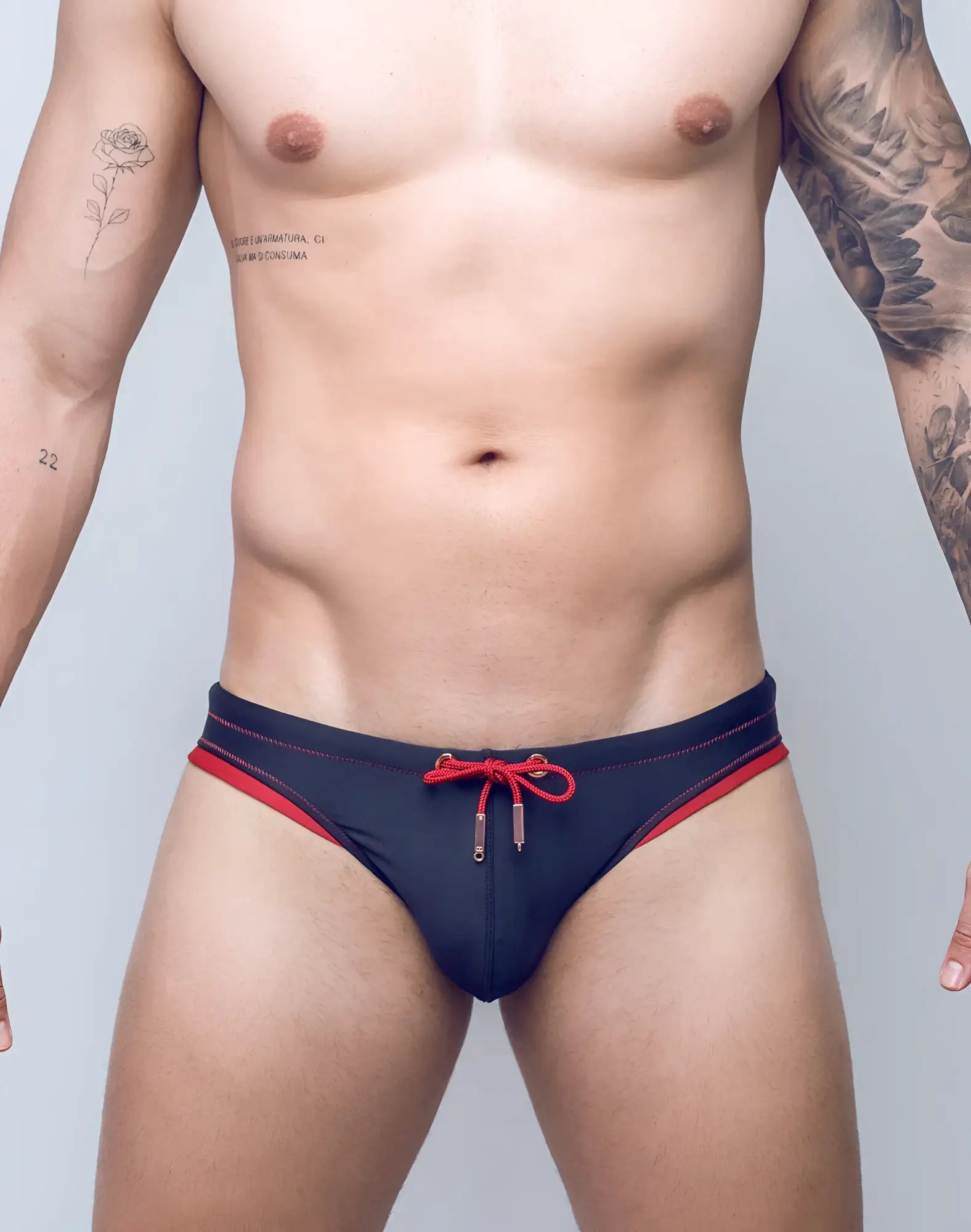 Navy blue V22 rapid swim brief with red trim and matching red drawstring tie for quick drying and comfort