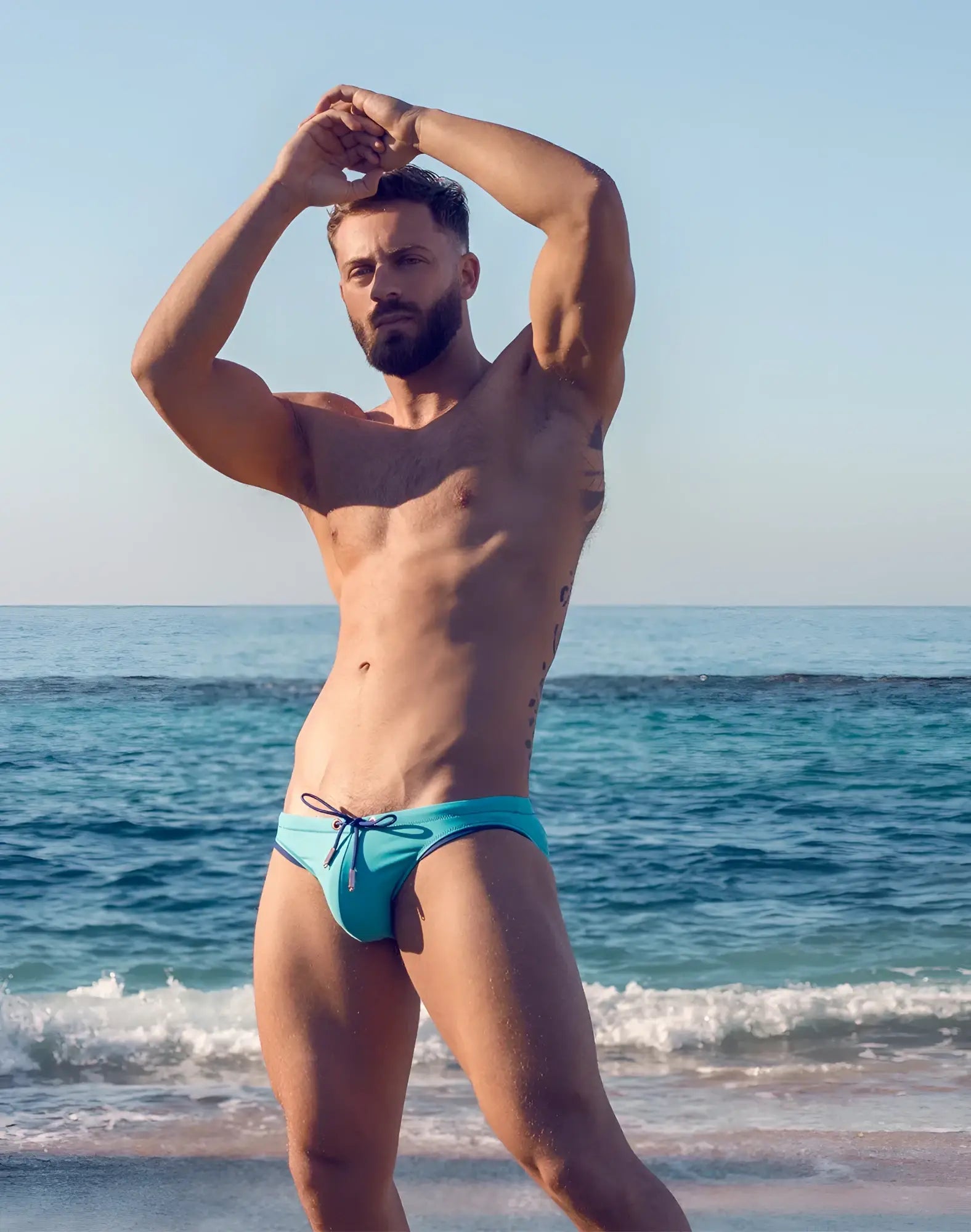 V22 rapid swim brief vibrant turquoise swim trunks with dark blue drawstring for swimming and beachwear