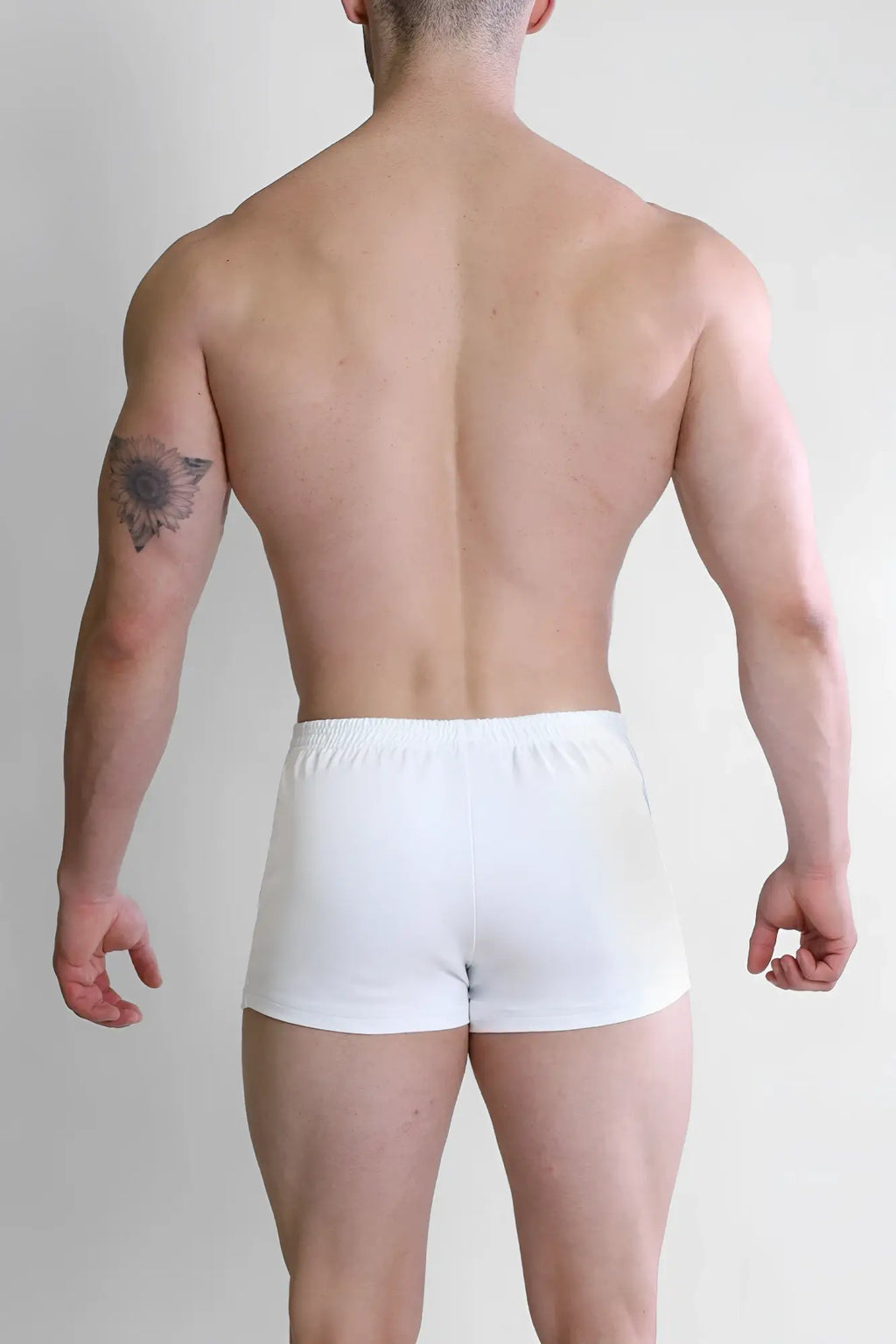 White cotton varsity 2 inch short shorts with zipper pocket and simple elastic waistband