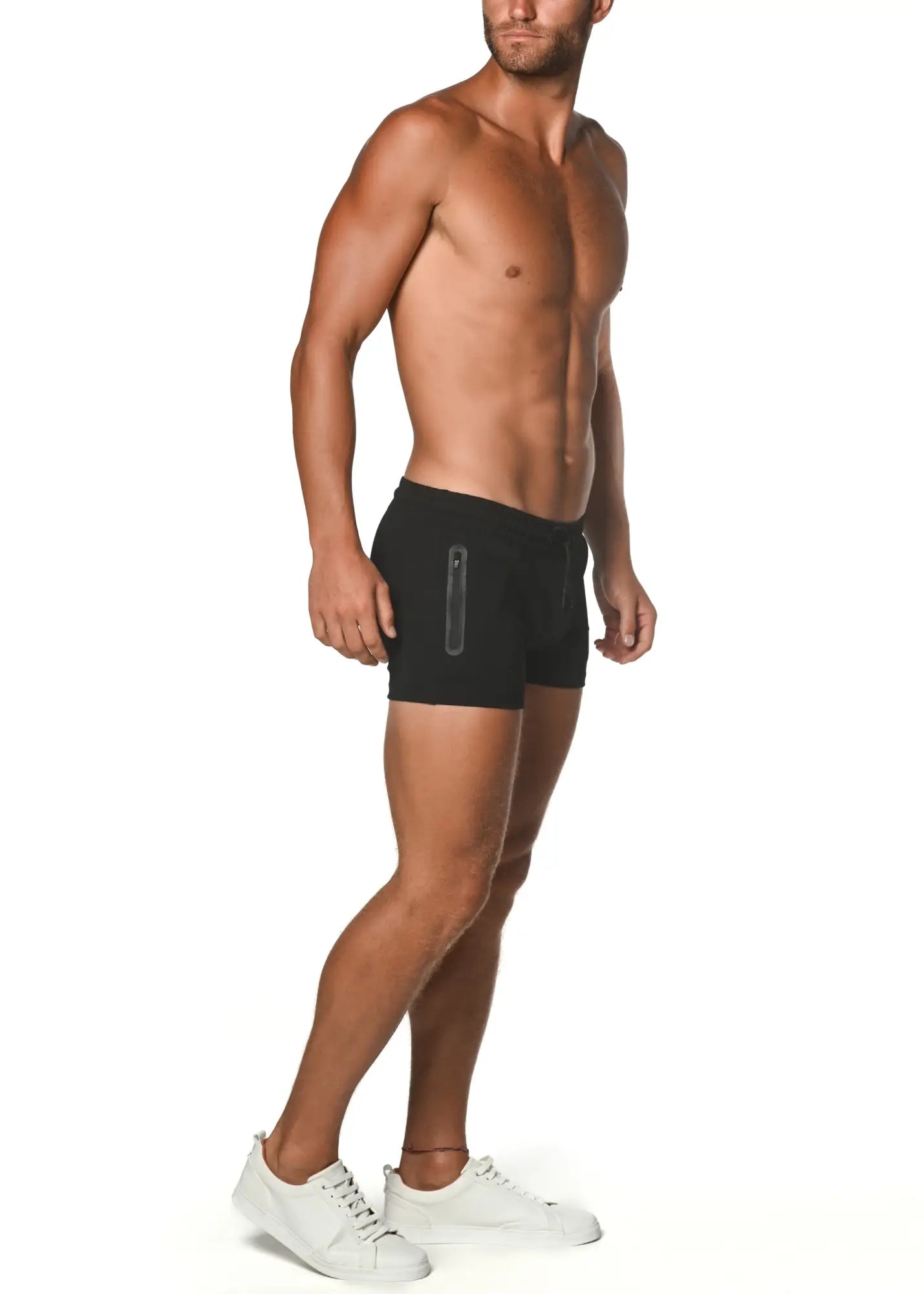 Black vault gym-tech stretch shorts with heat weld zippers and sleek vertical zipper detail on the side