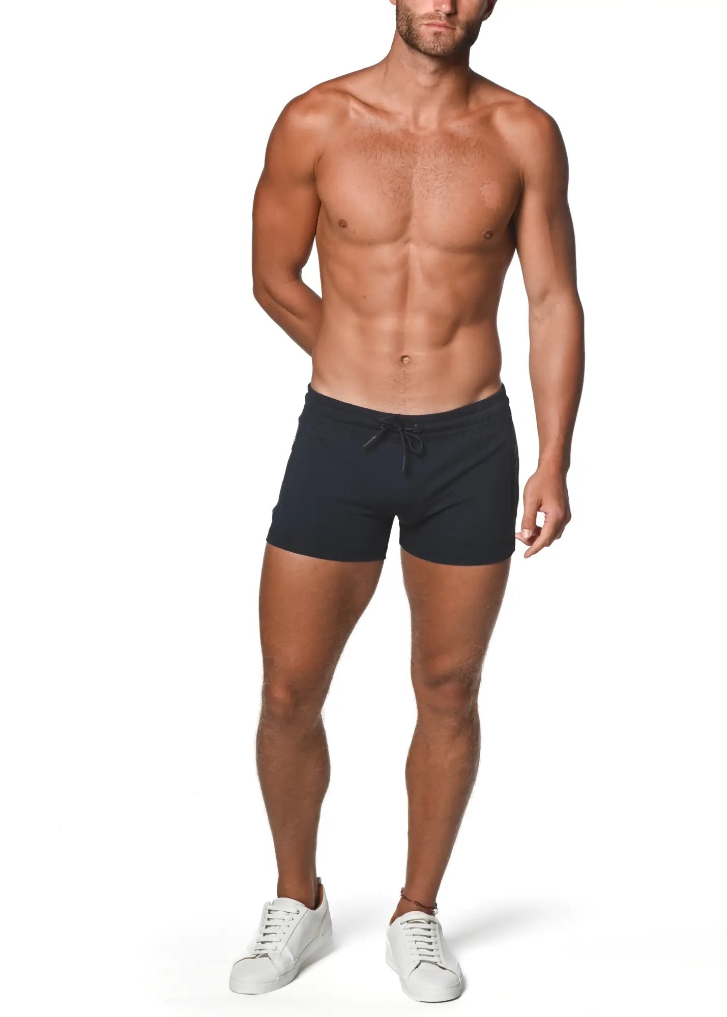 Black vault gym-tech stretch swim trunks with drawstring and heat weld zippers for active use