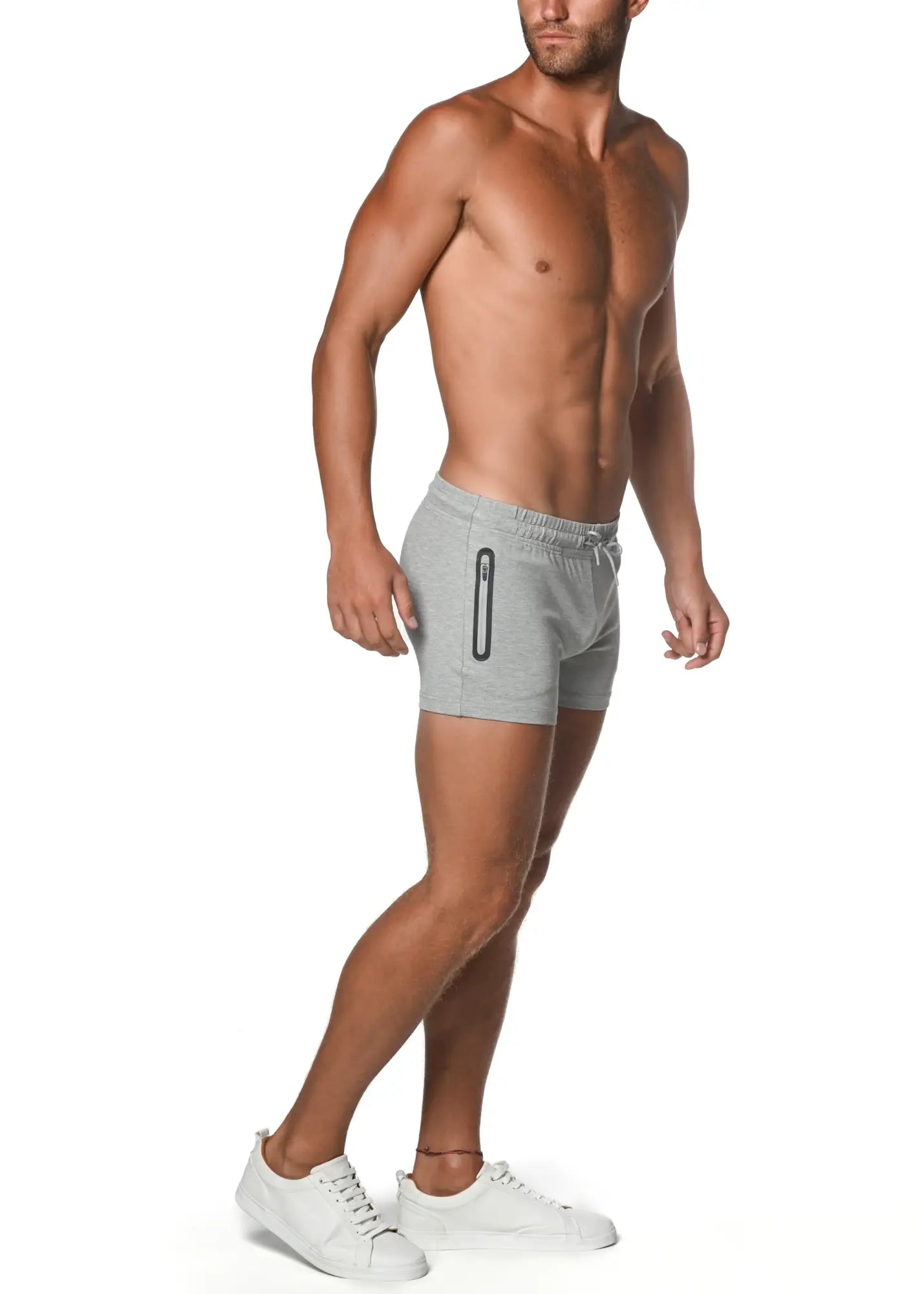 Gray vault gym-tech stretch shorts with black heat weld zippers on the side for athletic use