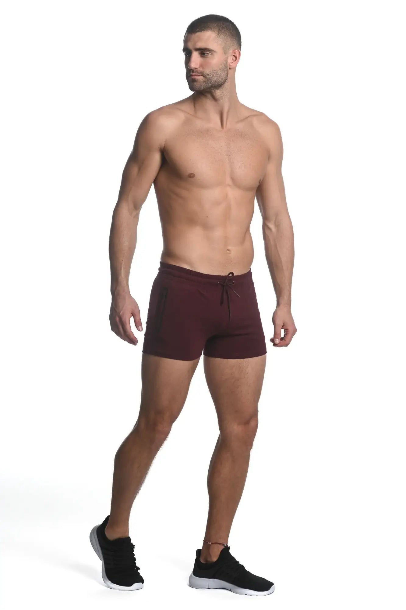 Maroon vault gym-tech stretch shorts with black side panels heat weld zippers and drawstring waistband for athletic use