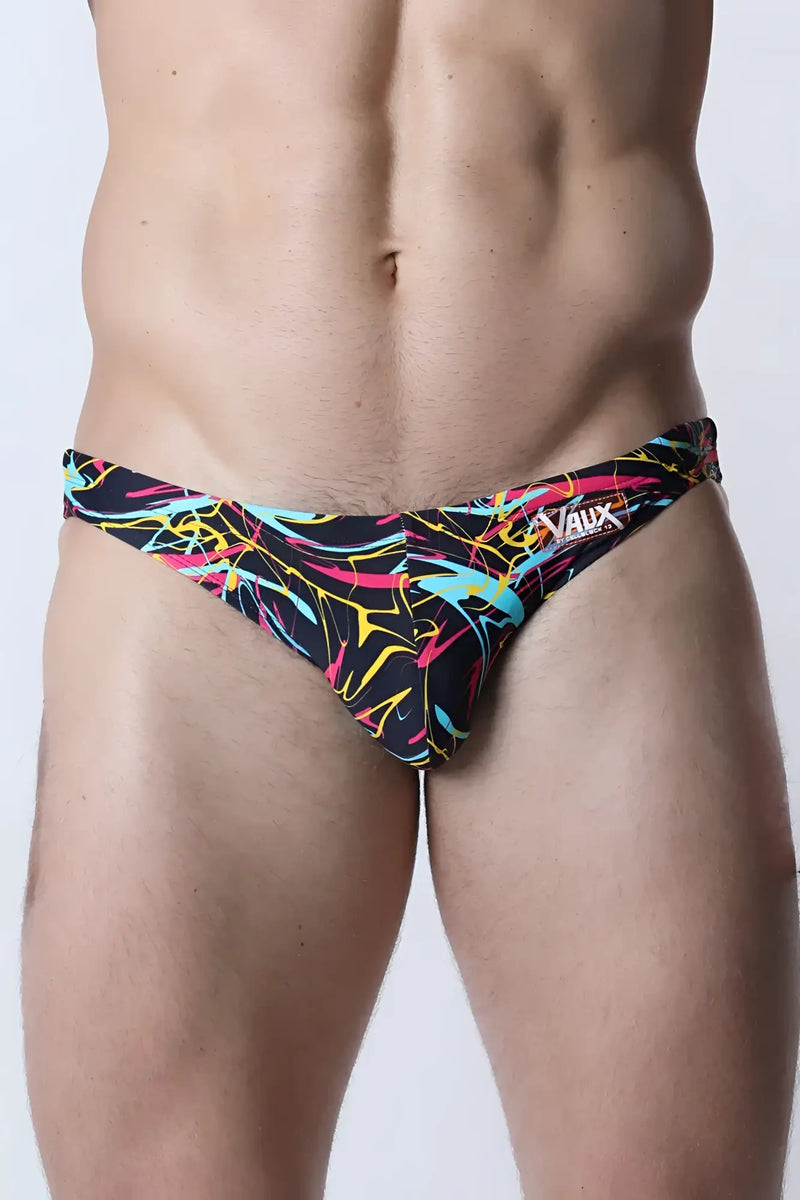 Pulse swim brief black swim trunks with vibrant neon pink yellow and cyan abstract line patterns for swimming